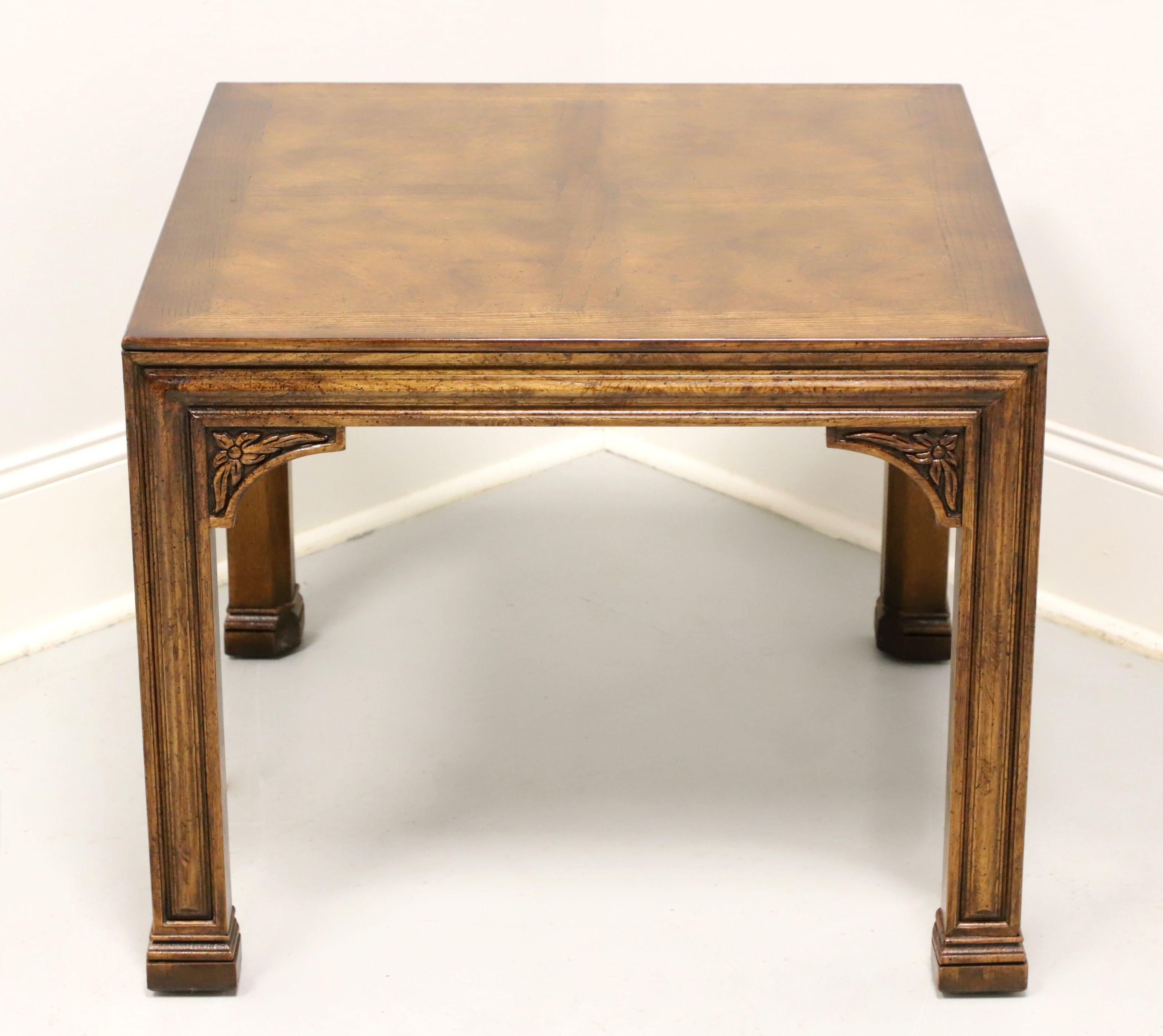 A French influenced square end table by Henredon. Oak with burl oak parquetry design to top, carved apron, decoratively carved corner joints, square straight legs, and block feet. Made in Morganton, North Carolina, USA, circa 1983.

Style #: 42