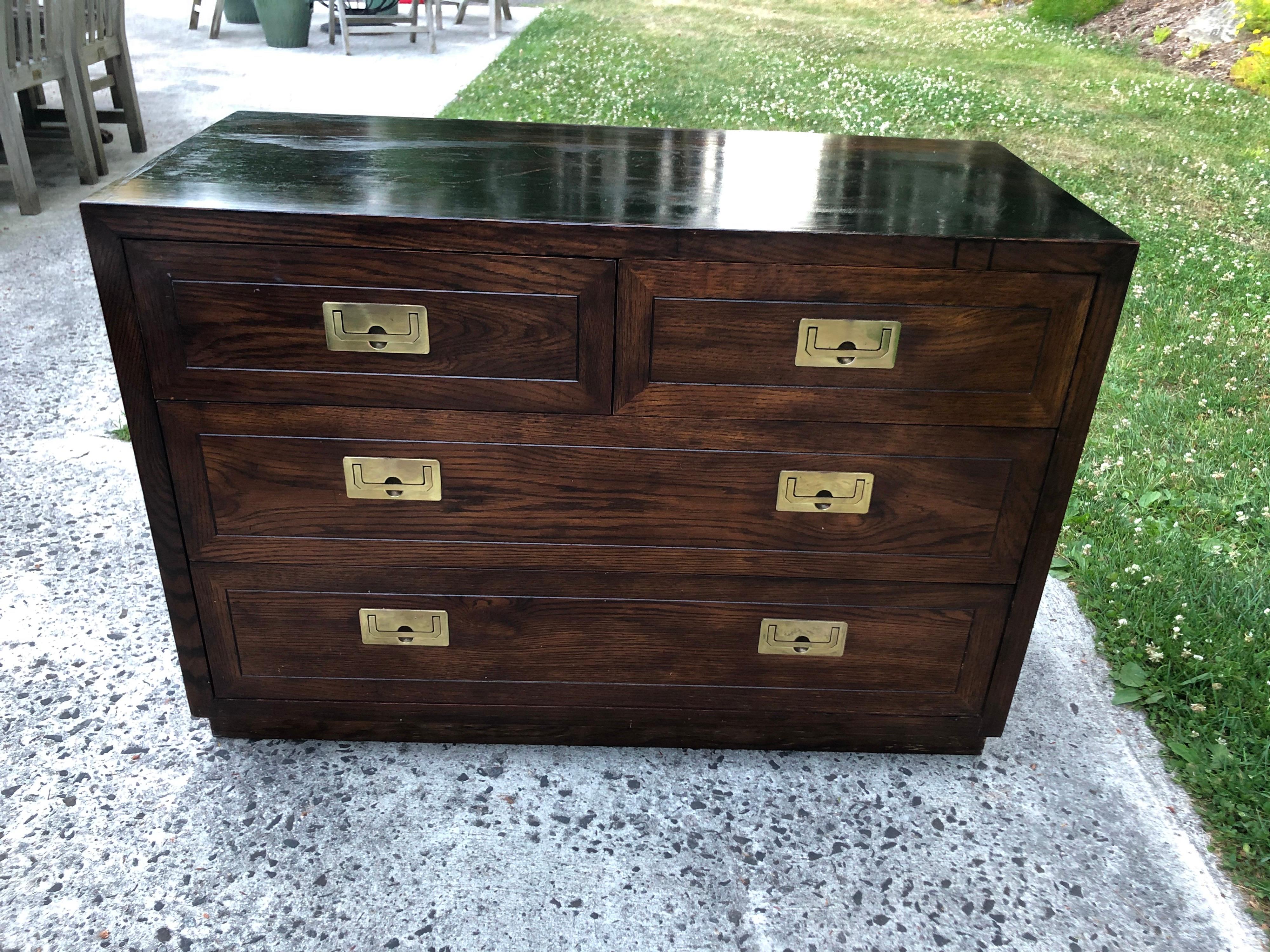 Henredon Campaign chest of drawers. Painted ebonized top which can be stripped or redo the whole thing in a bright color. Solid wooden well made timeless piece of furniture. Other ideas: Use as a bathroom vanity with a top mounted vessel sink. Or