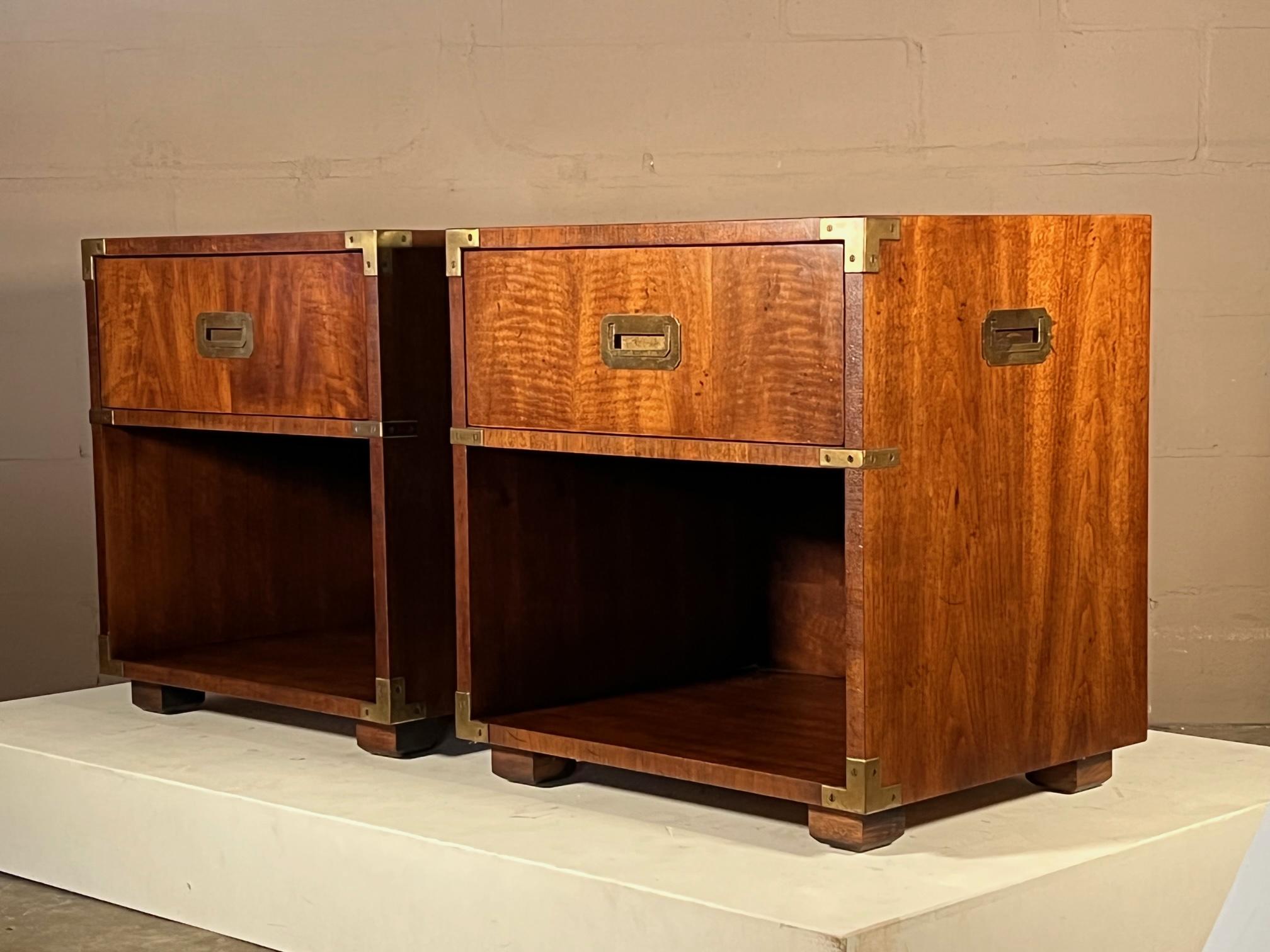 A pair of classic Henredon campaign style night stands with brass details. Each with single drawer, with outlet/extension cord and small cut out for electronic wire-see pics.
 
