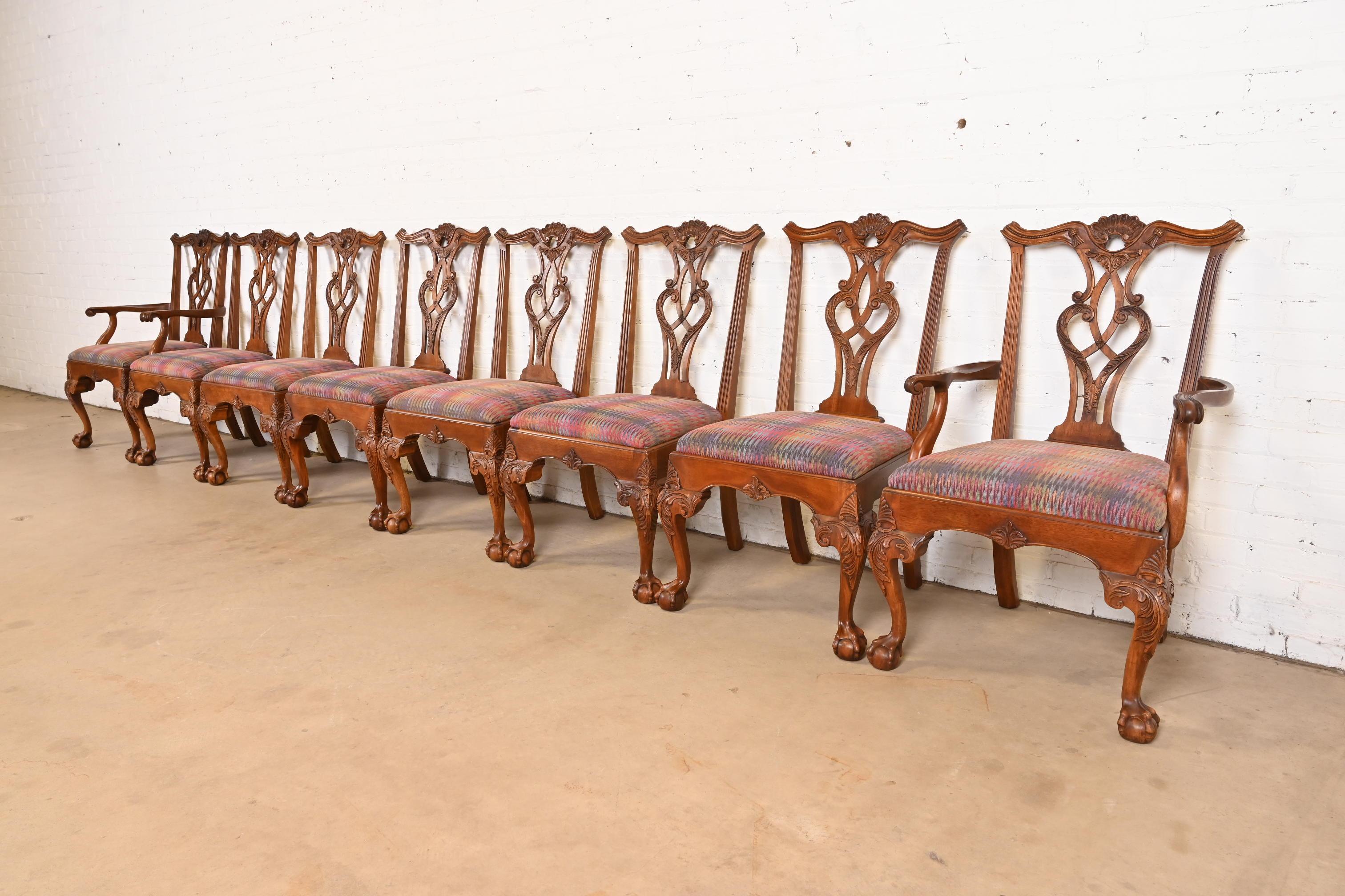 An outstanding set of eight Chippendale or Georgian style dining chairs

By Henredon

Circa Late 20th Century

Carved solid mahogany frames, with upholstered seats.

Measures:
Side Chairs: 23