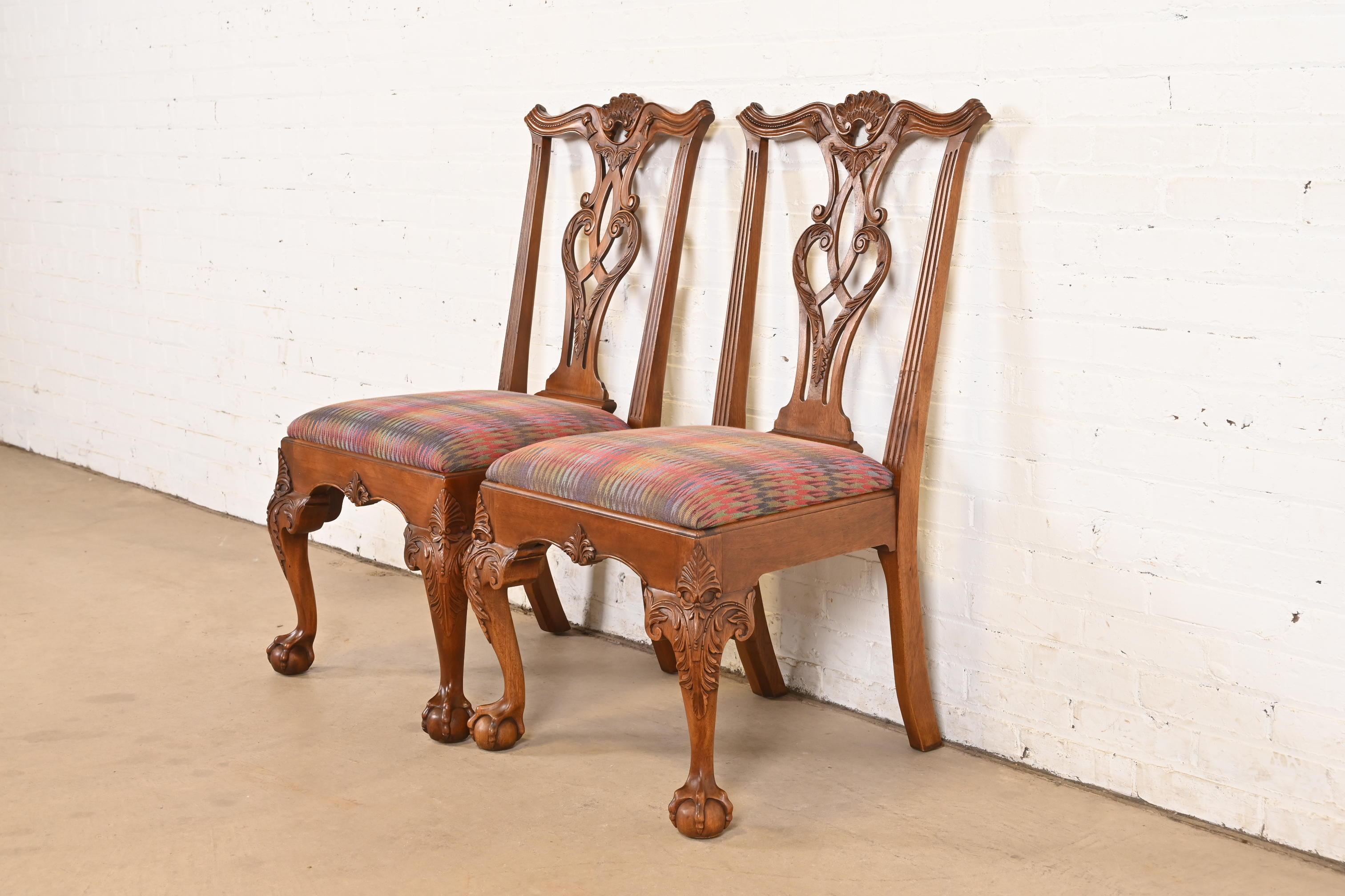 An outstanding pair of Chippendale or Georgian style dining chairs

By Henredon

Circa Late 20th Century

Carved solid mahogany frames, with upholstered seats.

Measures: 23