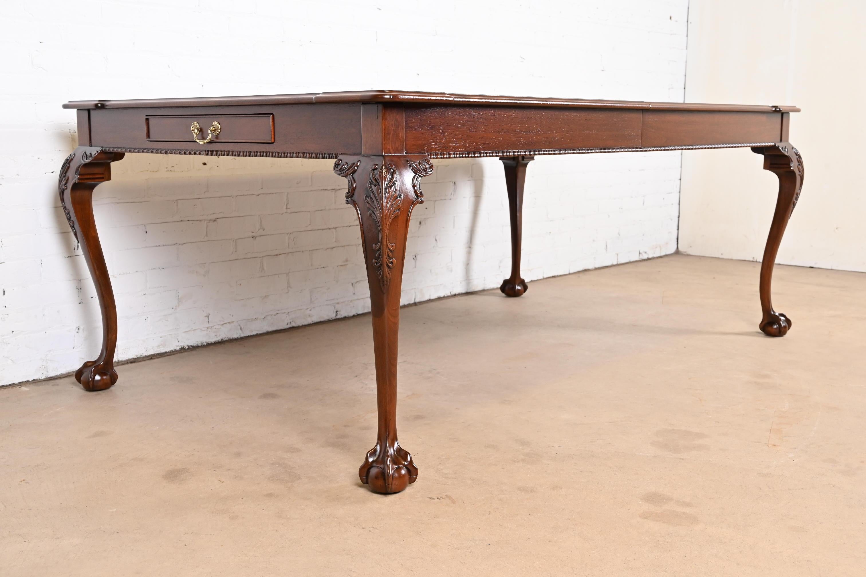 Brass Henredon Chippendale Mahogany and Burl Wood Dining Table, Newly Refinished For Sale