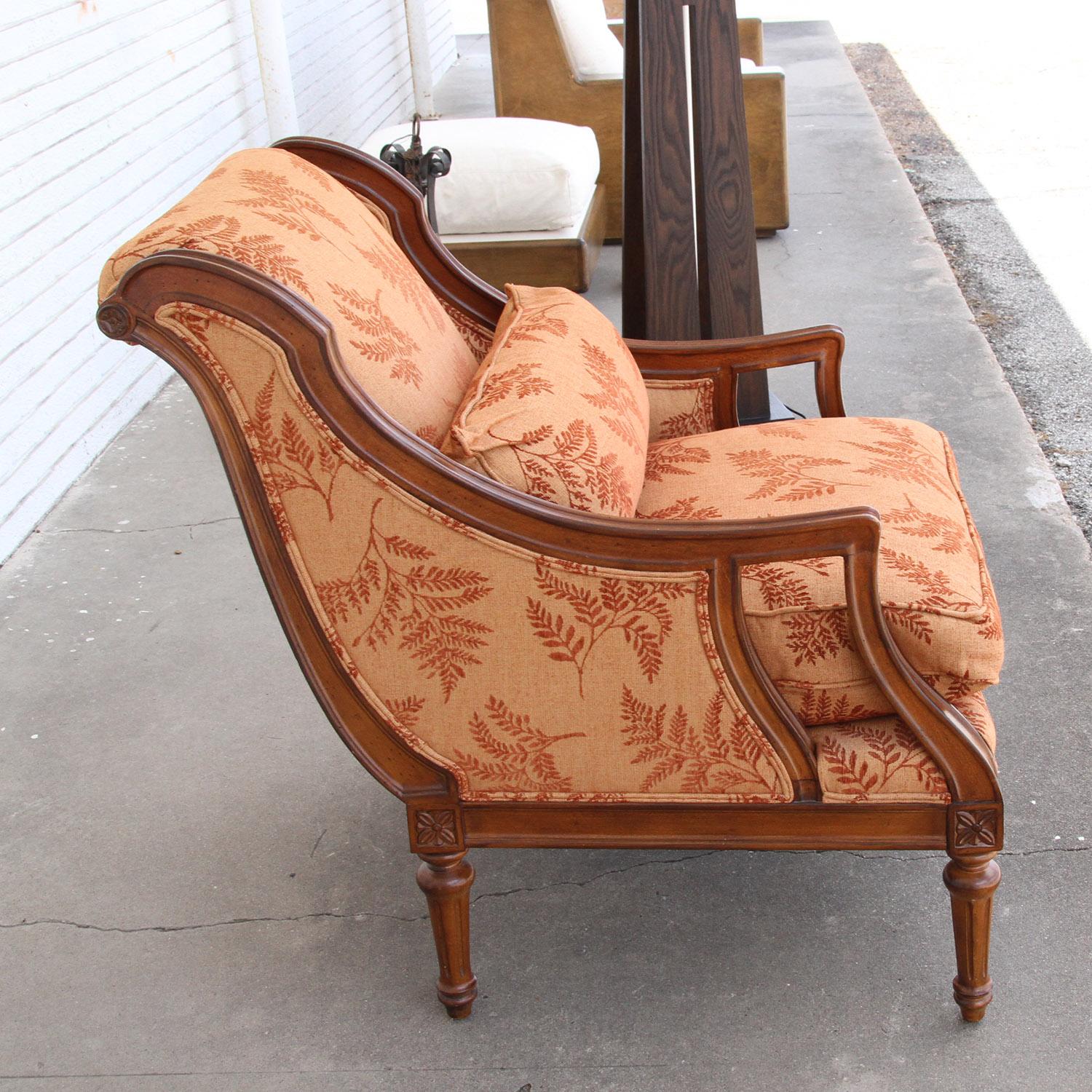 20th century French Empire style carved wood lounge chair

Rich upholstery compliments the beautiful curves of this Henredon chair.