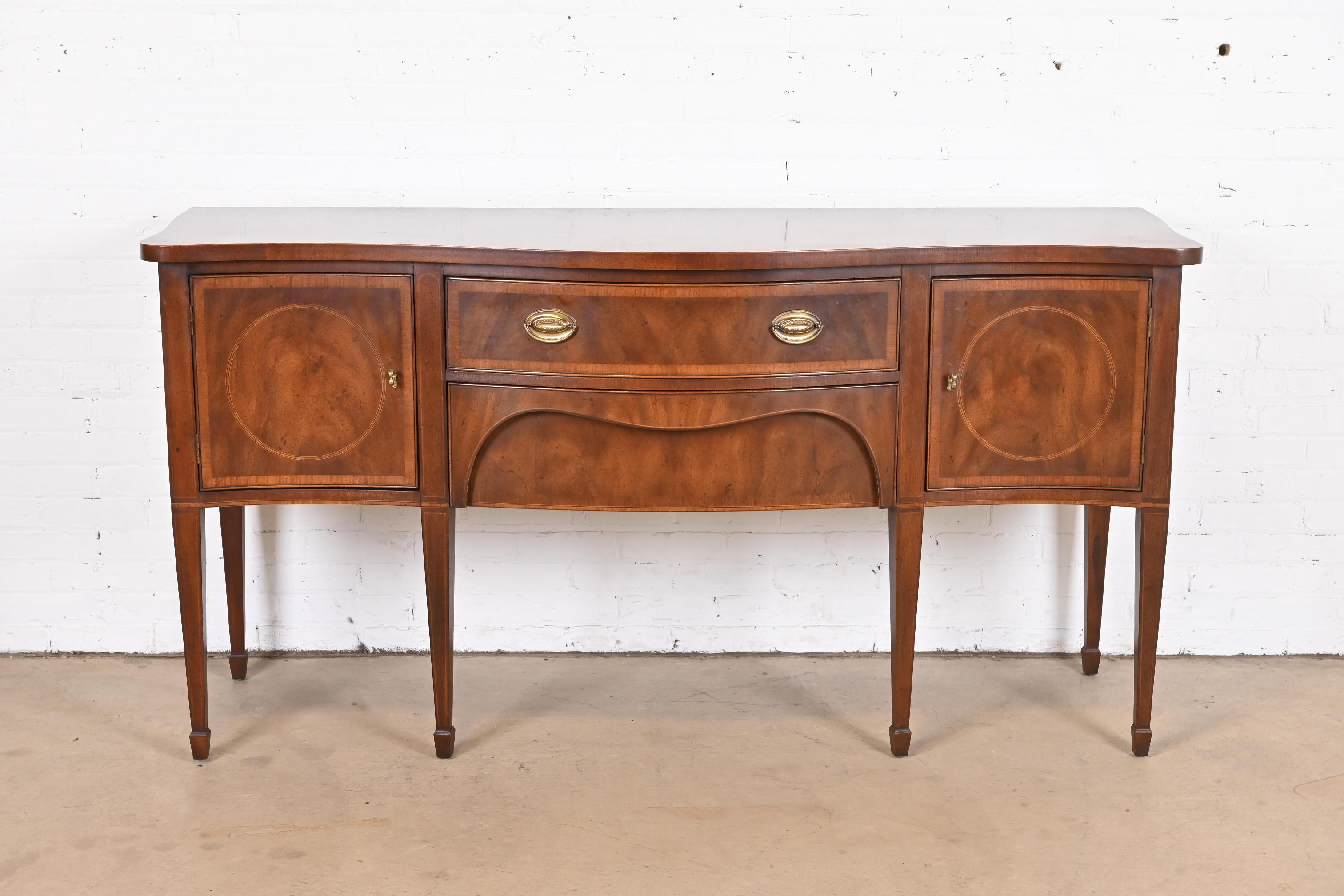 A gorgeous Federal or Hepplewhite style serpentine front sideboard, buffet, or credenza

By Henredon, 