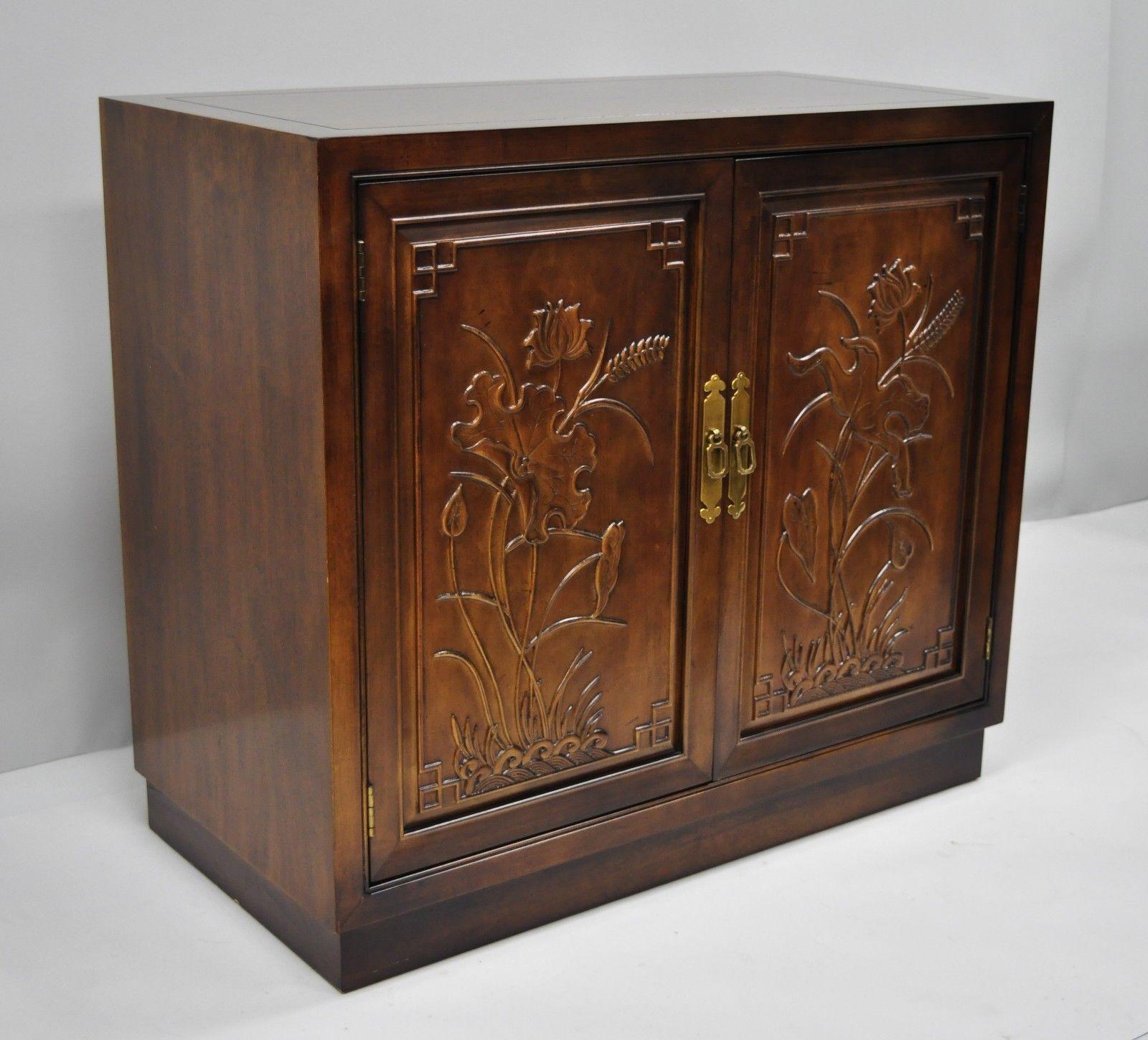 Henredon Folio 16 Asian chinoiserie floral carved server cabinet. Item details solid wood construction, beautiful wood grain, nicely carved details, two swing doors, original label, serial number #4000-48 4238-PLT, one dovetailed drawer, solid brass