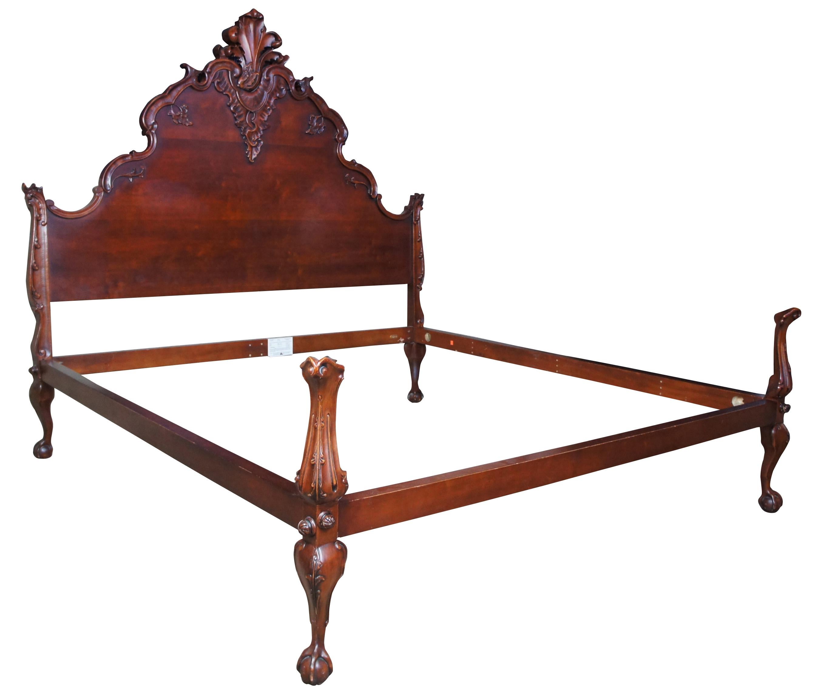 Henredon for Ralph Lauren king size mahogany bed. Influenced by Chippendale and Baroque styling with a dramatic arched headboard featuring ornately scalloped design. Includes ball and claw feet.
  