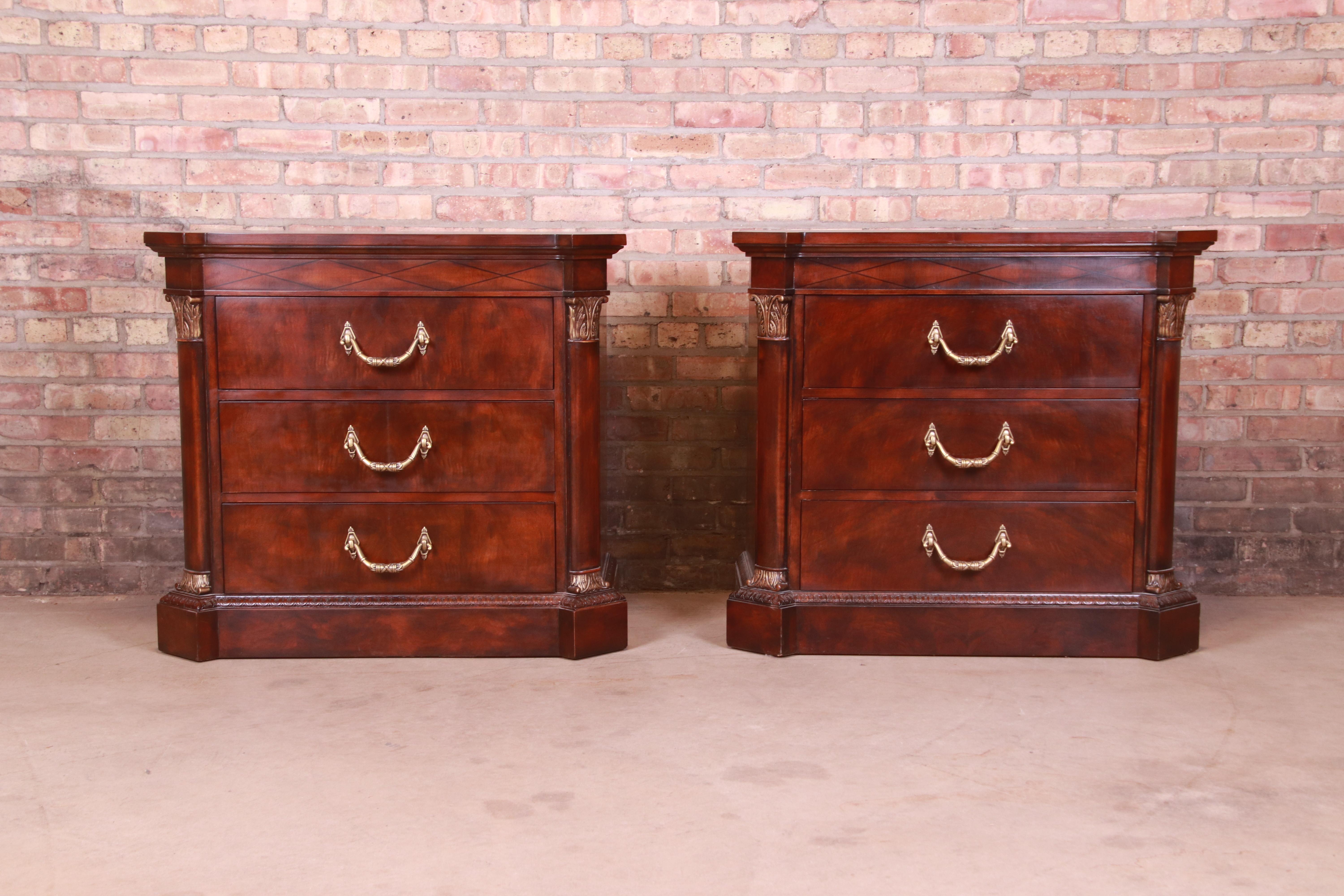 A gorgeous pair of neoclassical or French Empire style nightstands

By Henredon

USA, Circa 1980s

Mahogany, with giltwood details and original brass hardware.

Measures: 36