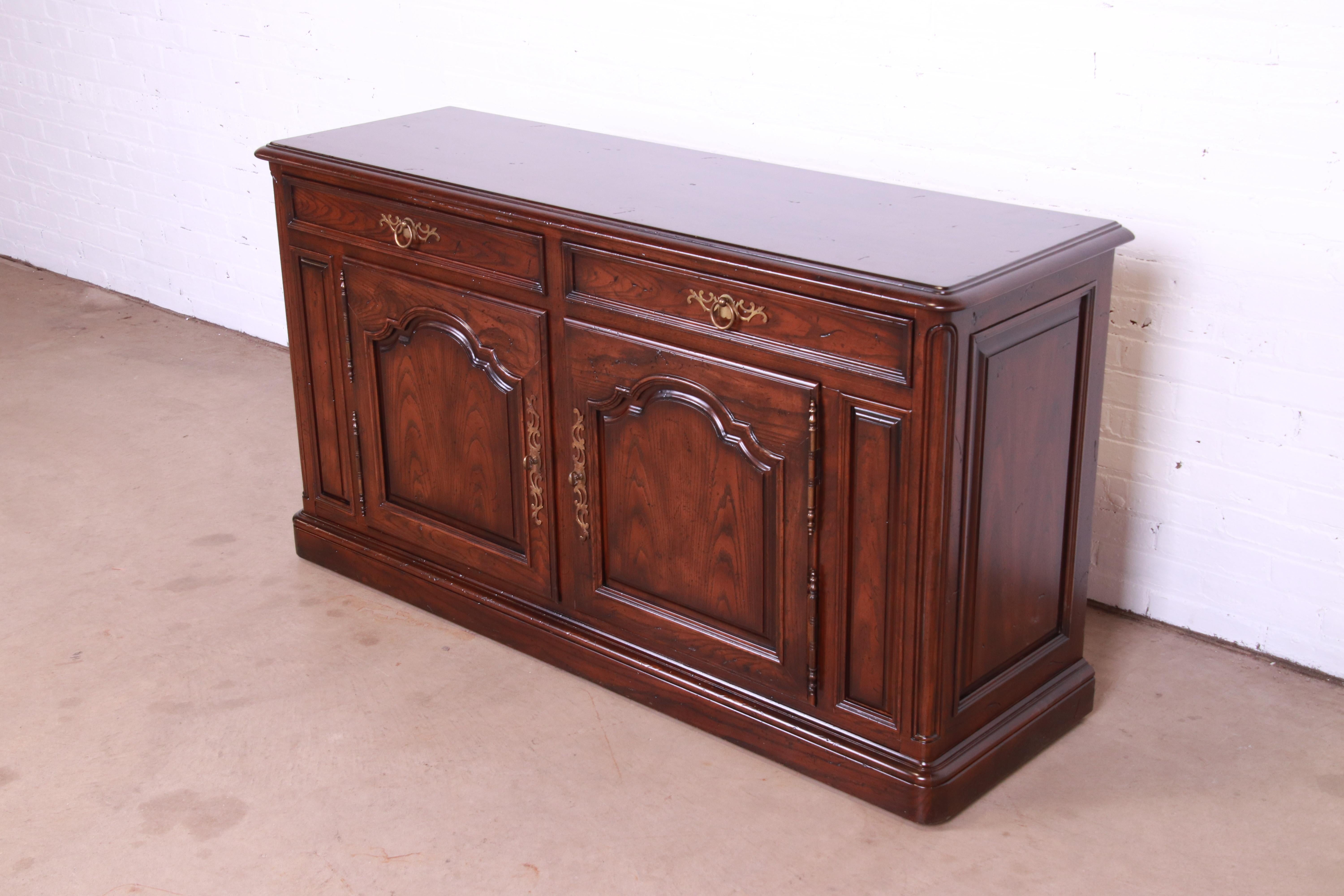 American Henredon French Provincial Carved Oak Sideboard or Bar Cabinet, Circa 1970s For Sale