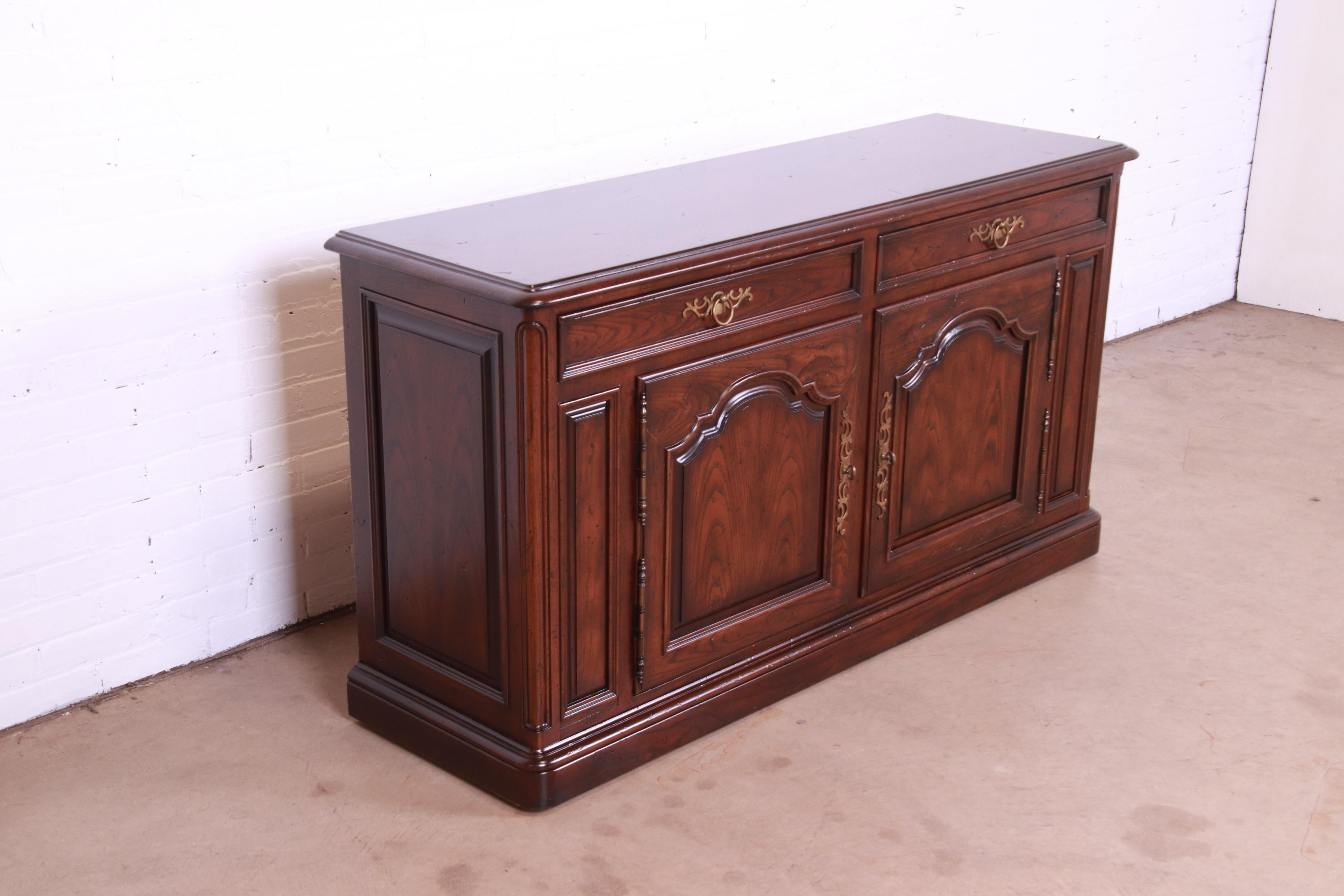 20th Century Henredon French Provincial Carved Oak Sideboard or Bar Cabinet, Circa 1970s For Sale