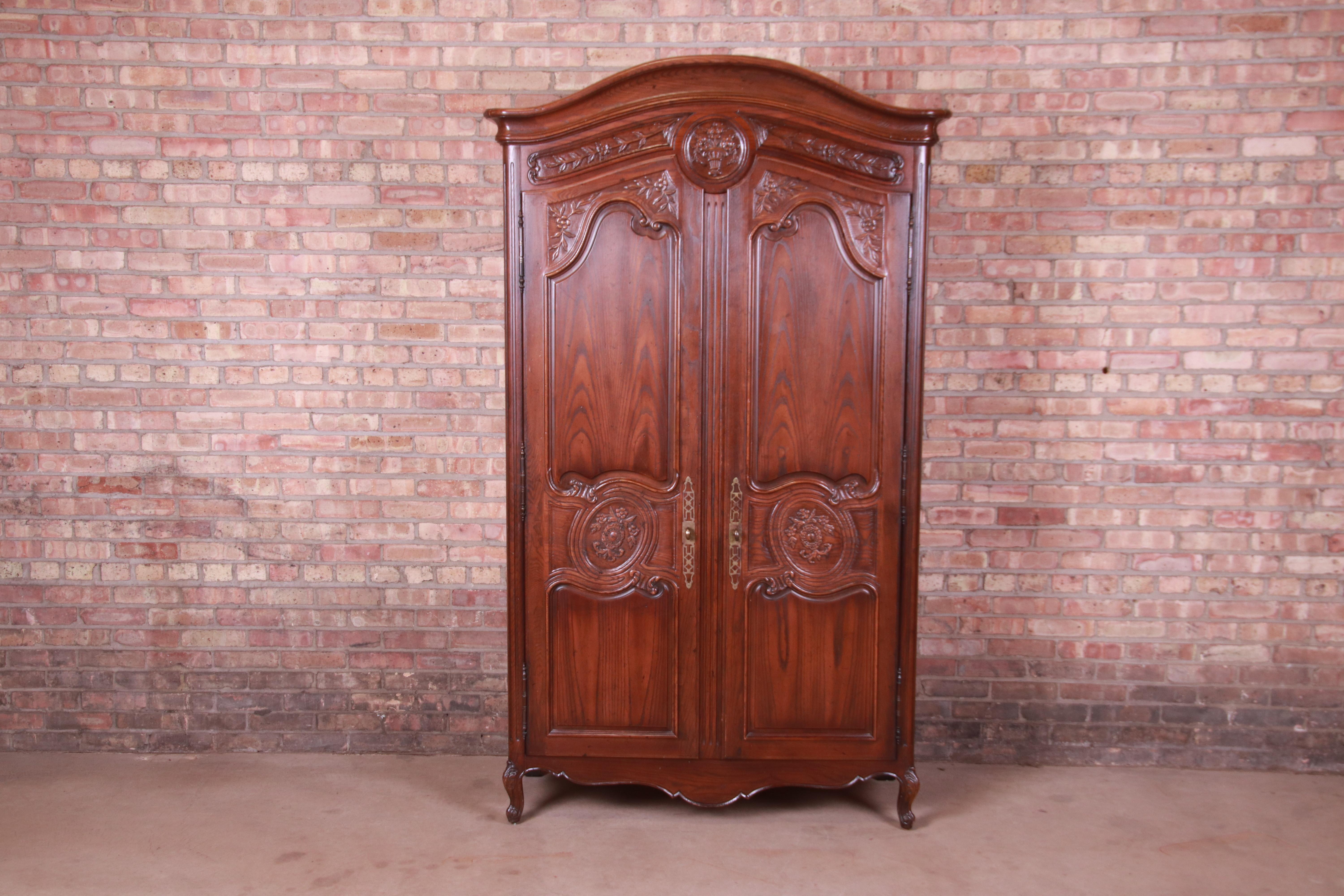 A gorgeous French Provincial Louis XV style armoire dresser

By Henredon, 