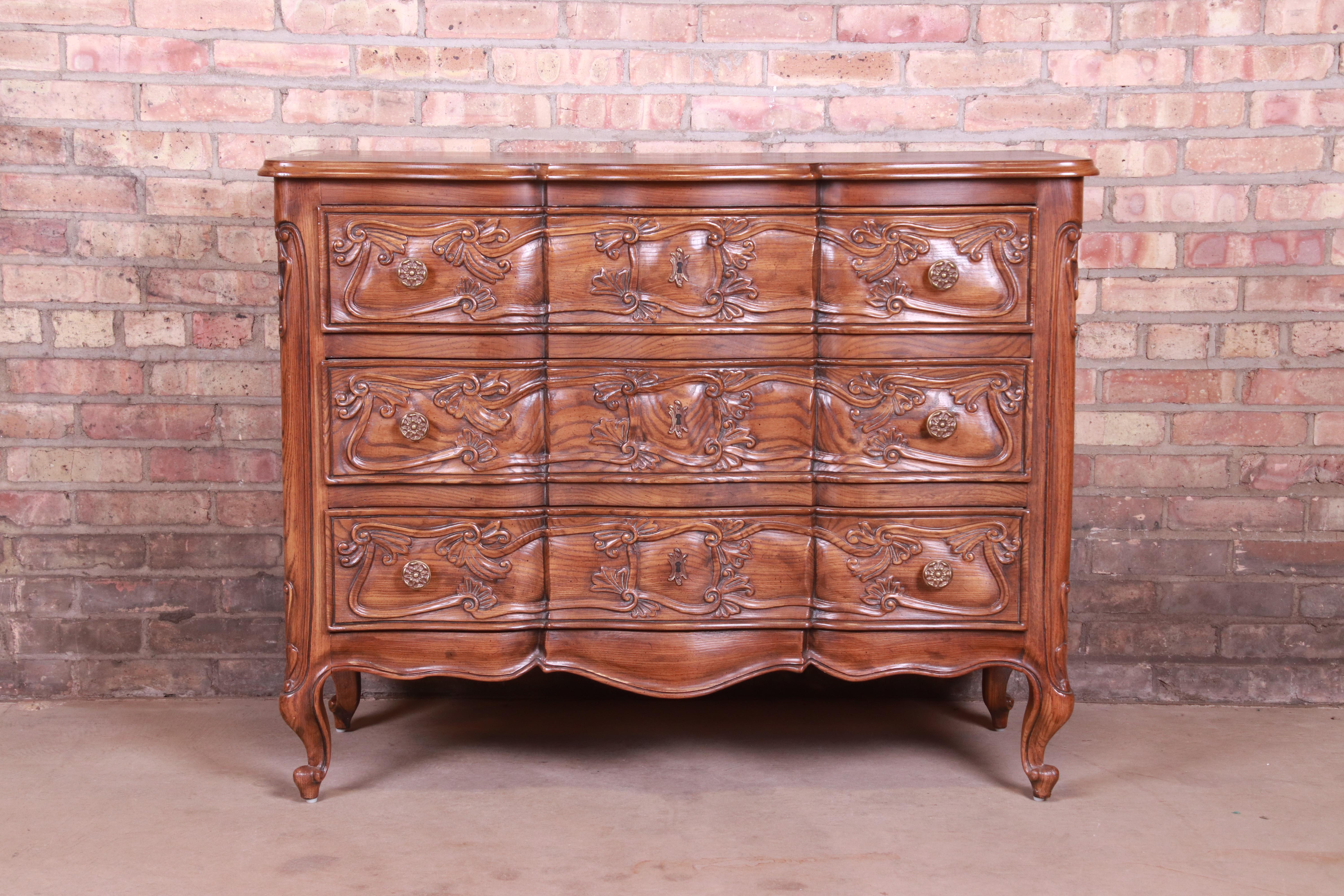 A gorgeous French Provincial Louis XV style commode or dresser chest

By Henredon 