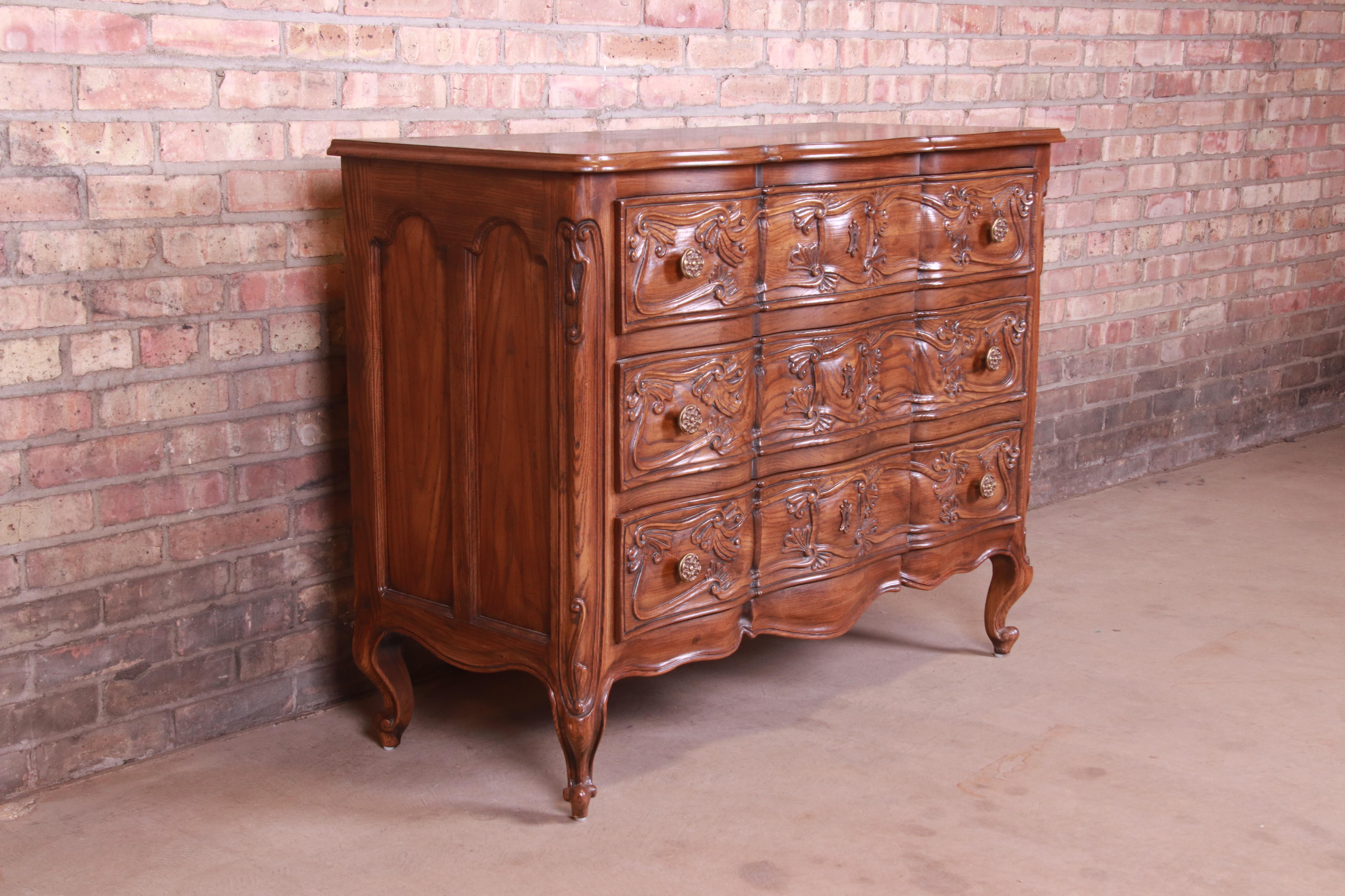 20th Century Henredon French Provincial Louis XV Carved Oak Commode or Chest of Drawers