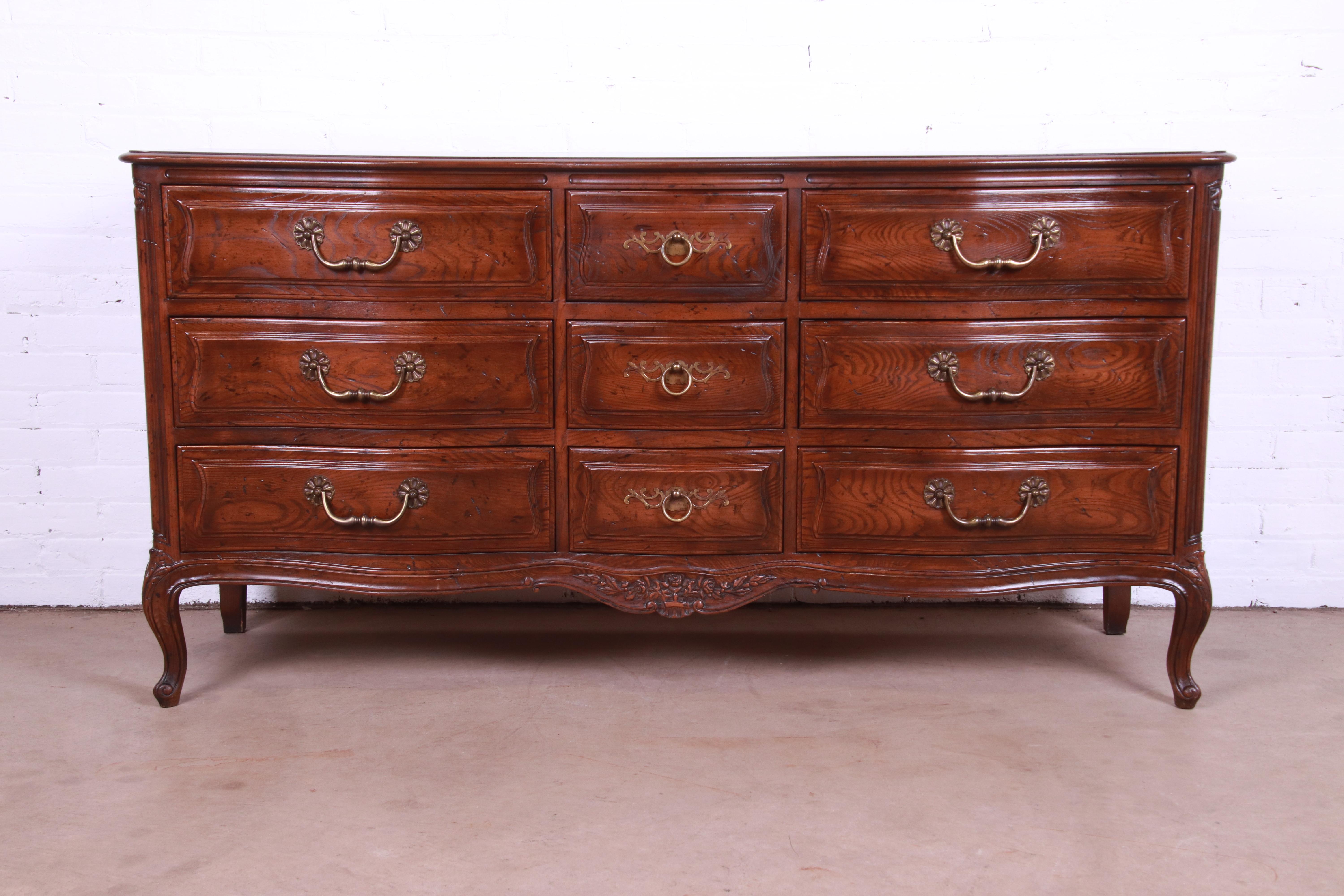 A gorgeous French Provincial Louis XV style nine-drawer long dresser or credenza

By Henredon, 