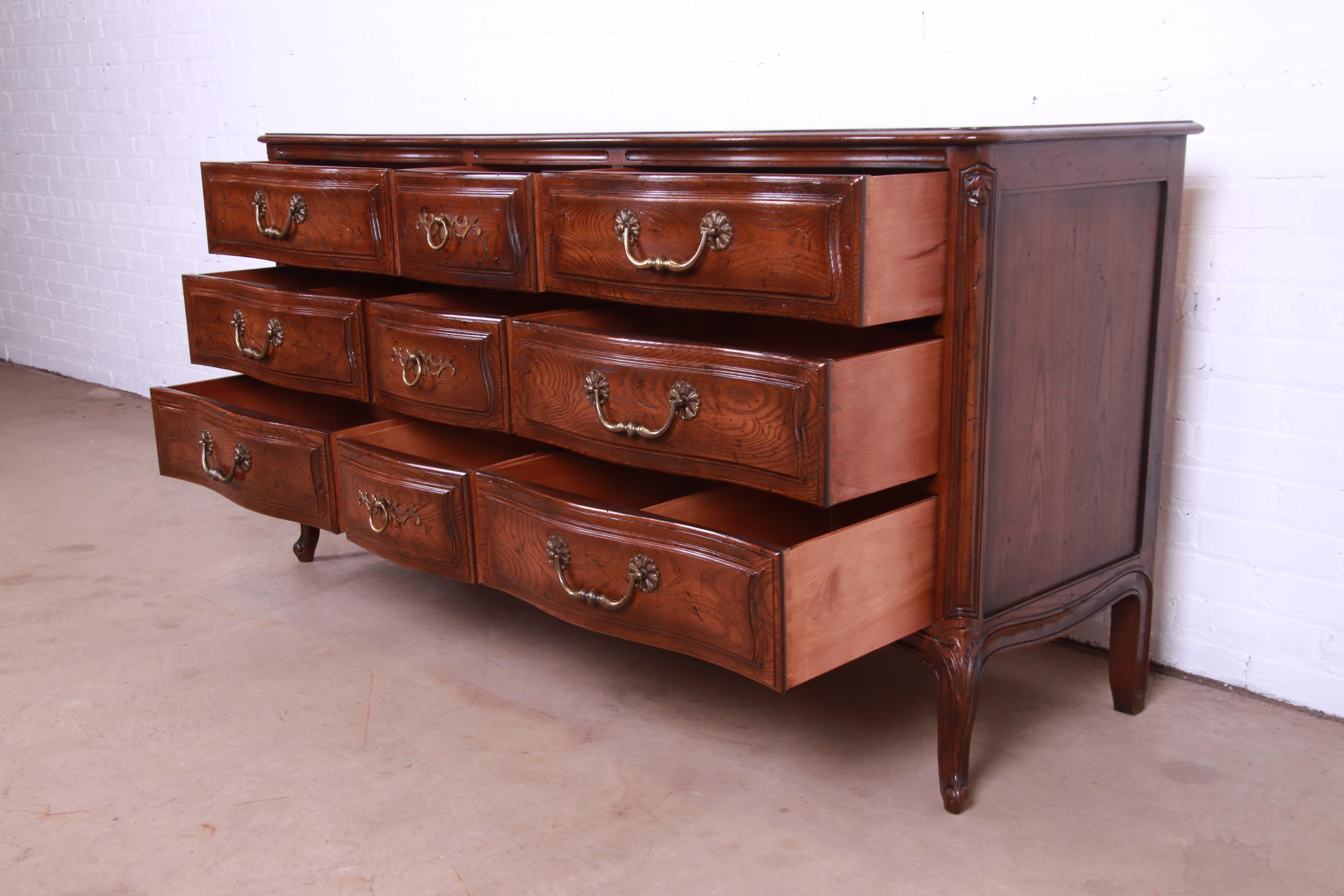 20th Century Henredon French Provincial Louis XV Carved Oak Triple Dresser or Credenza