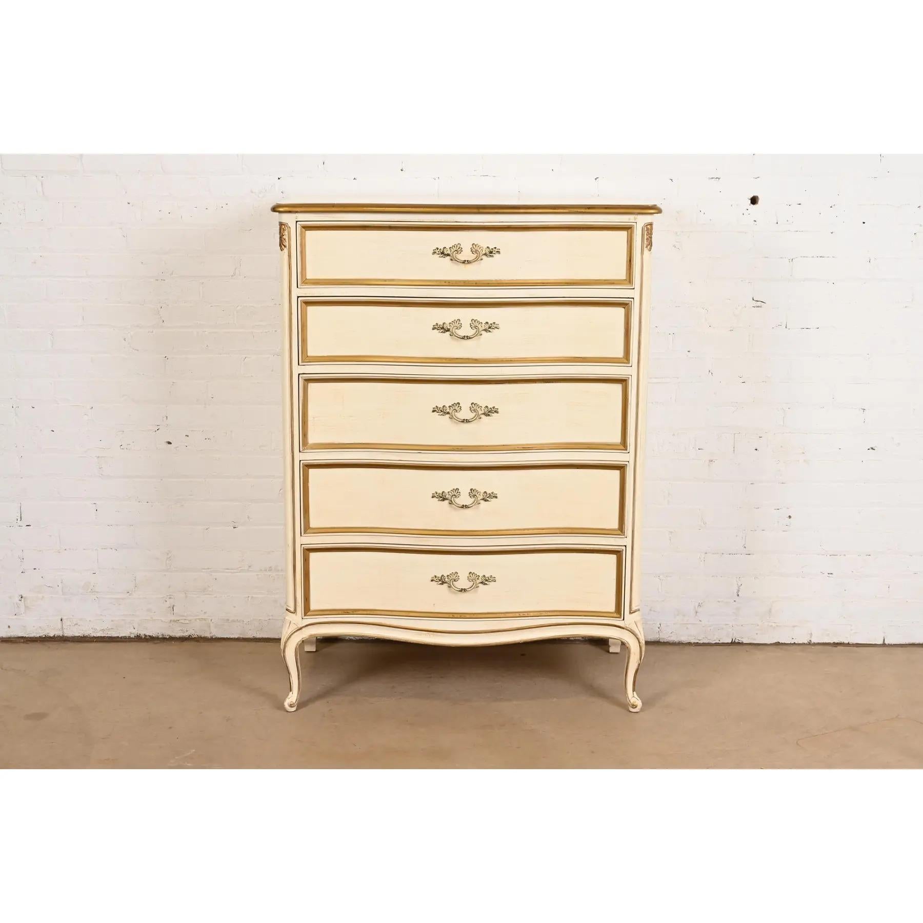 A gorgeous French Provincial Louis XV style five-drawer highboy dresser 

By Henredon

USA, Circa 1960s

Carved cream lacquered walnut, with gold gilt trim, and original brass hardware.

Measures: 36