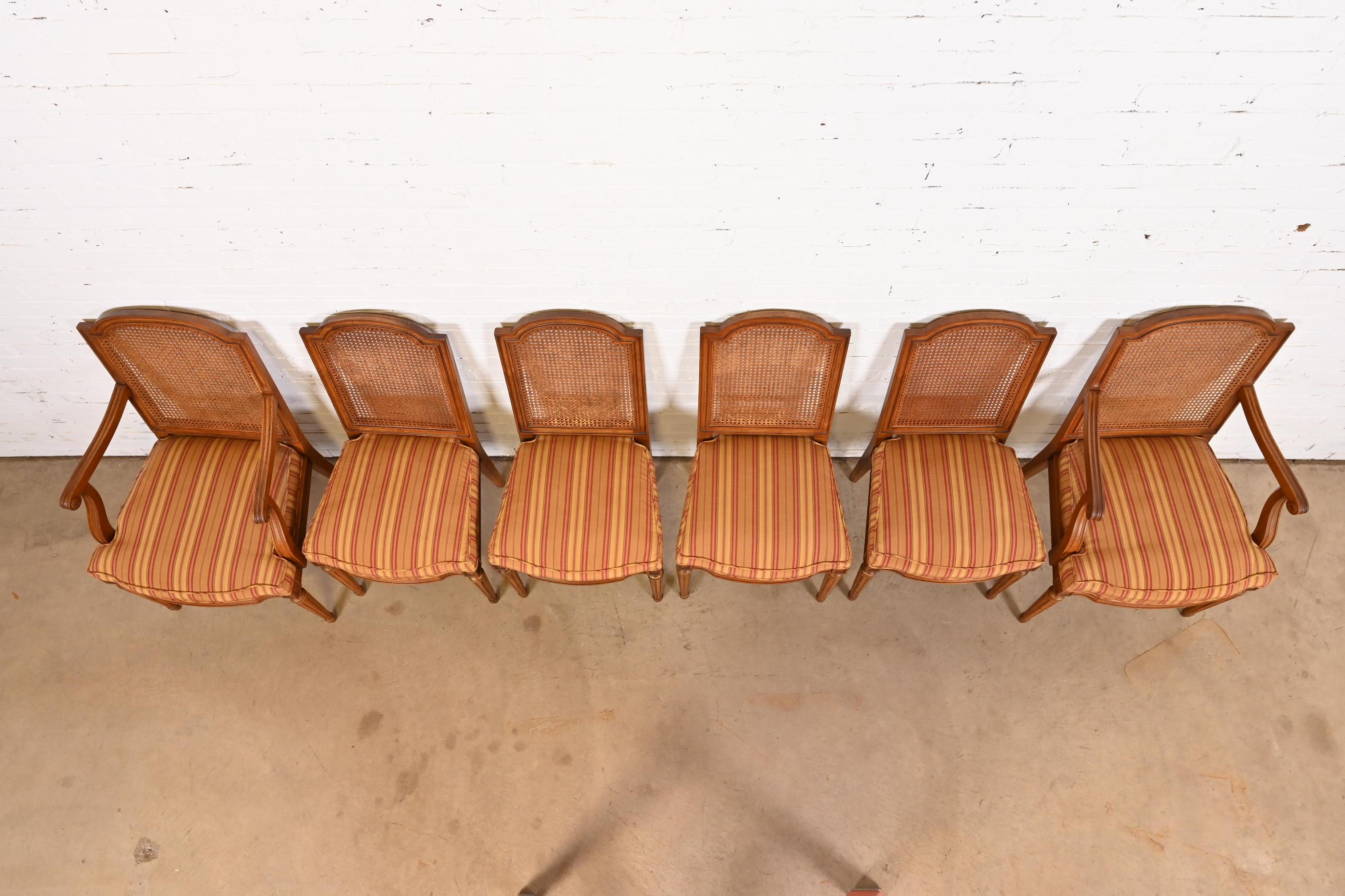 Mid-20th Century Henredon French Regency Louis XVI Carved Walnut Cane Back Dining Chairs
