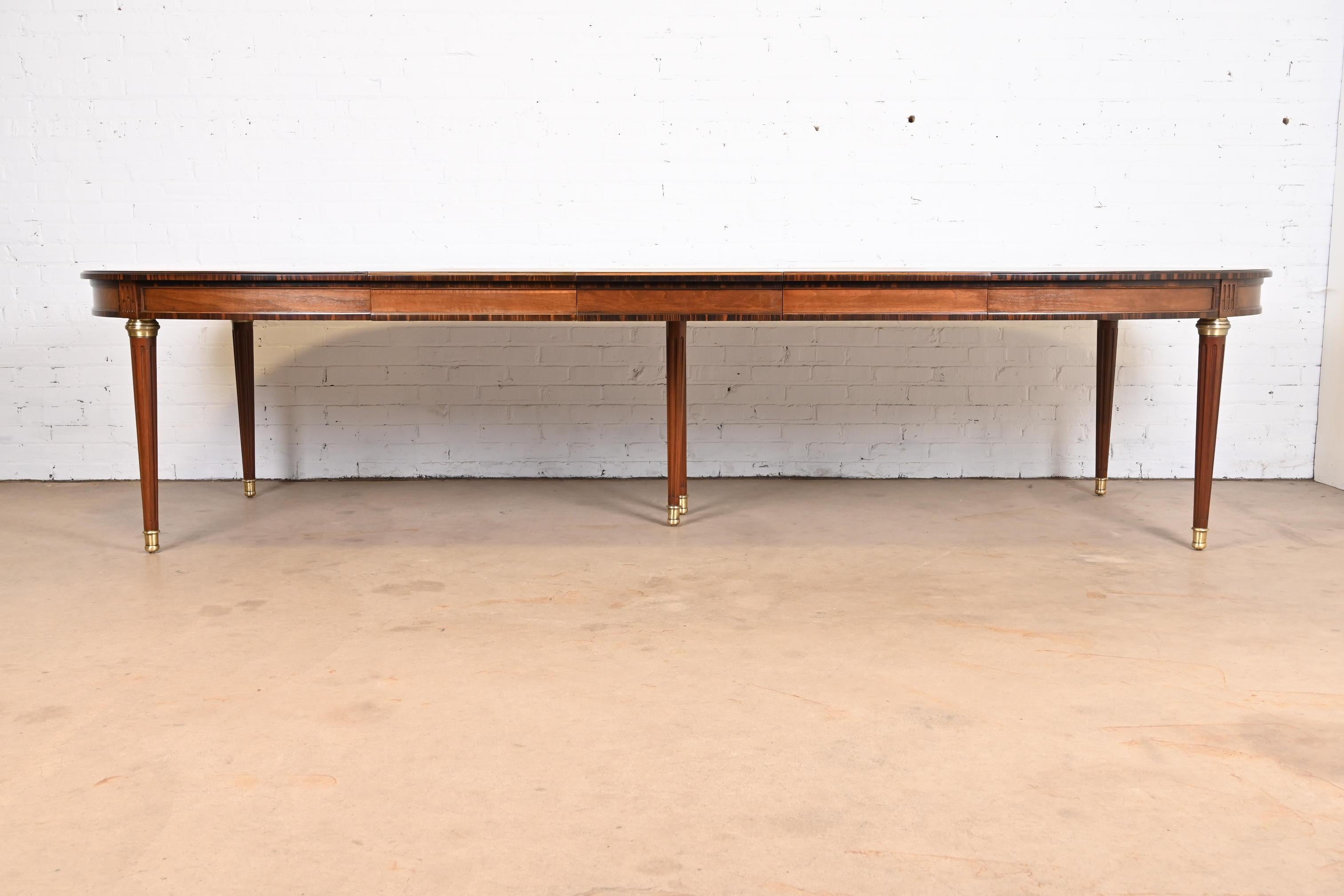 American Henredon French Regency Louis XVI Cherry and Macassar Ebony Dining Table