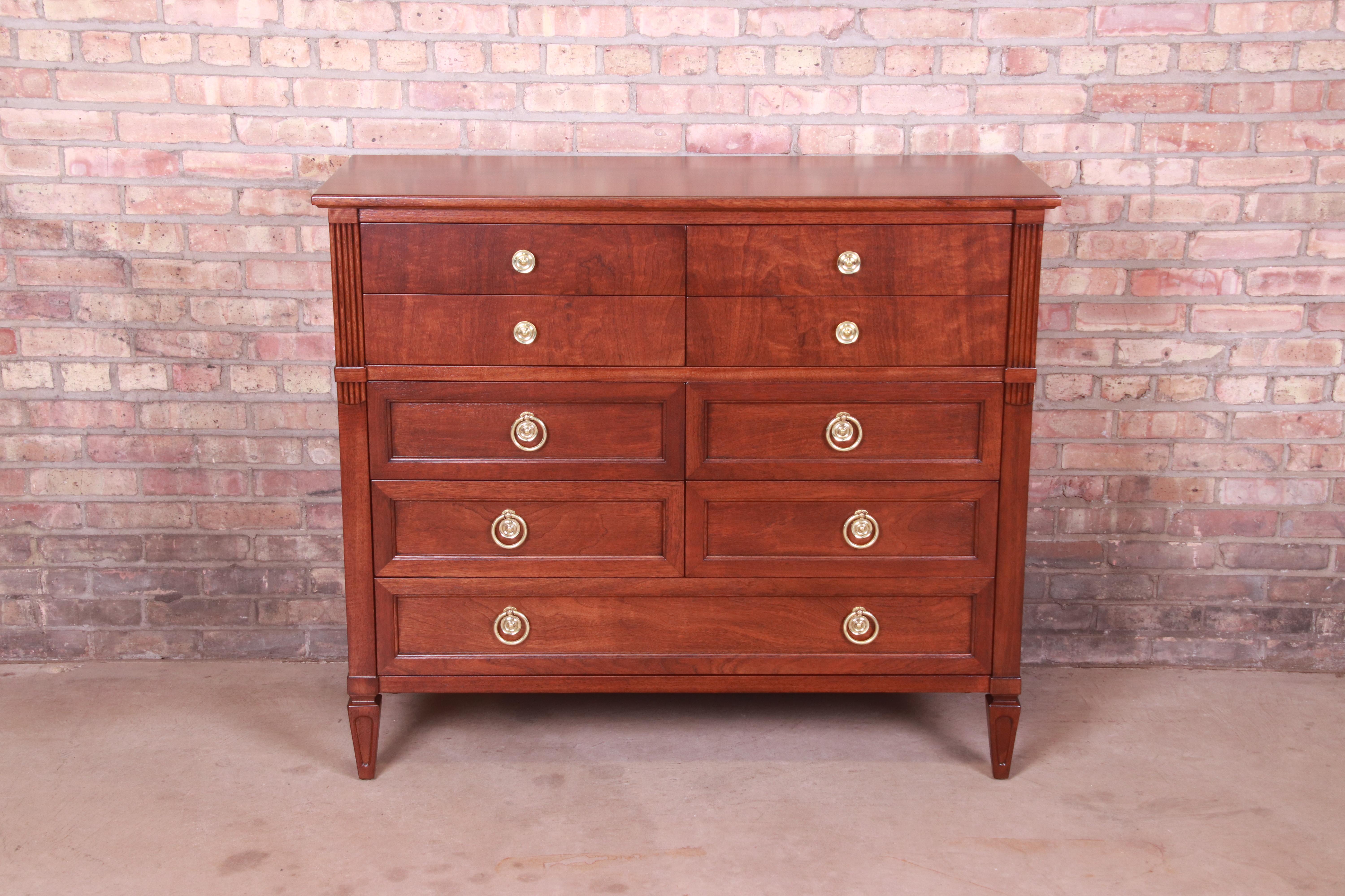 A gorgeous French Regency Louis XVI style highboy dresser chest

By Henredon

USA, Circa 1960s

Mahogany, with original brass hardware.

Measures: 48