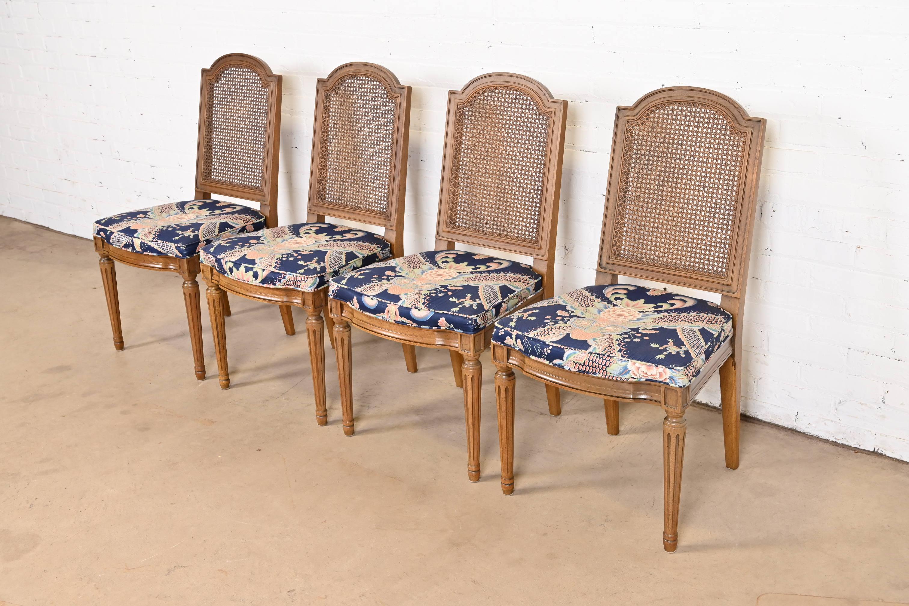 American Henredon French Regency Louis XVI Walnut Cane Back Dining Chairs, Set of Four For Sale