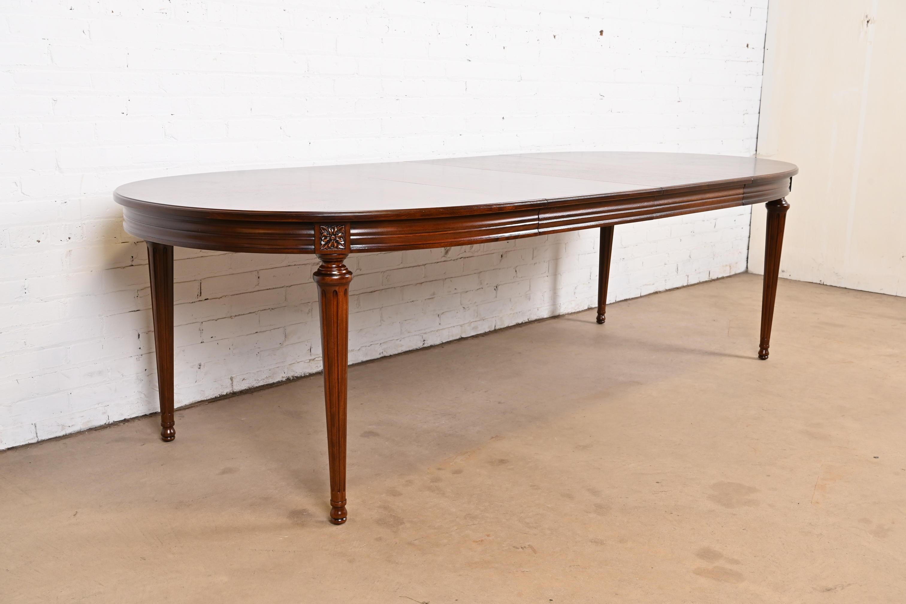 American Henredon French Regency Louis XVI Walnut Extension Dining Table, Refinished For Sale