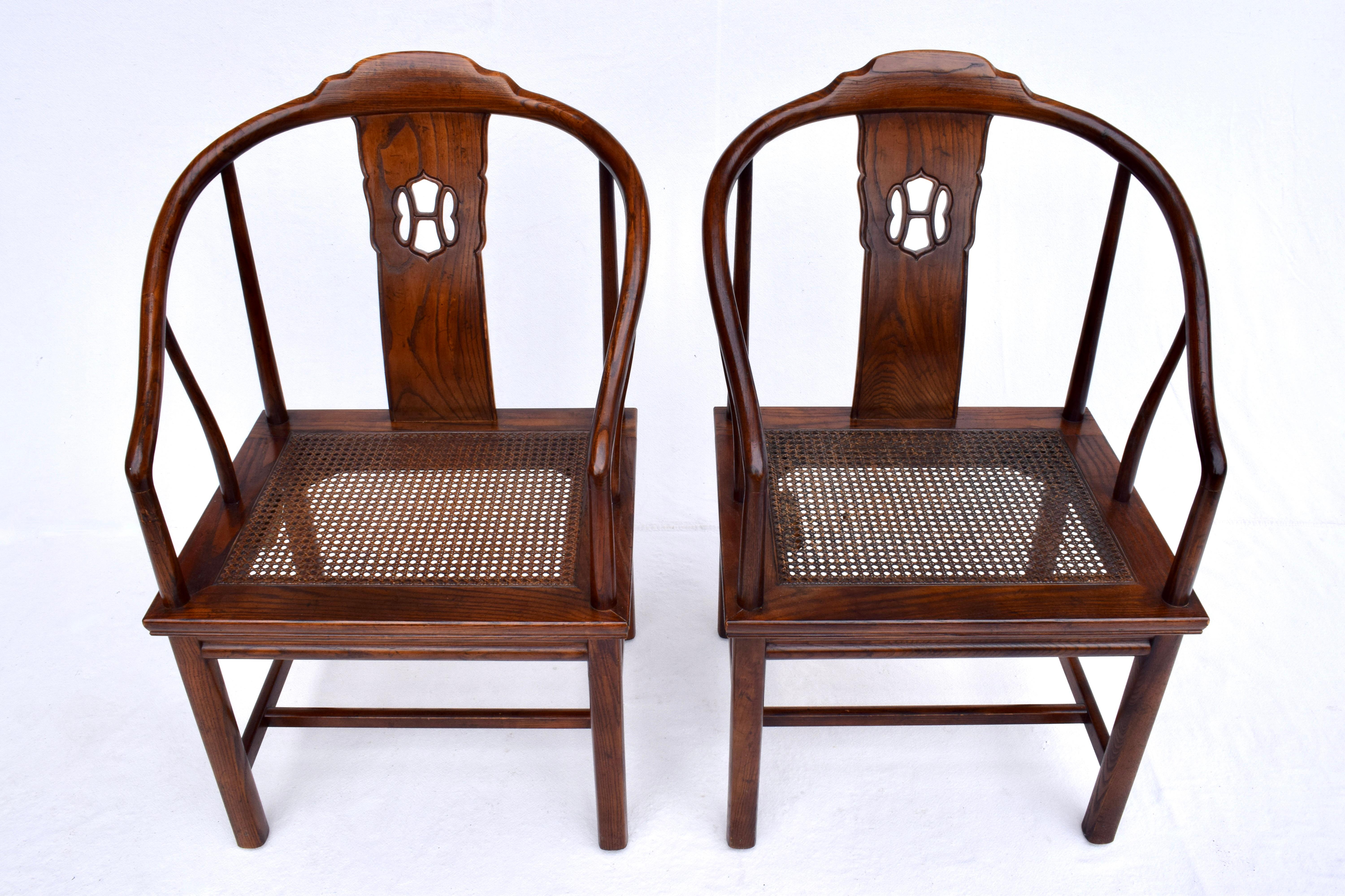 A pair of solid Oak dining chairs with caned seats by Henredon Furniture boasting surprisingly transitional aesthetics & exceptional cradling support & comfort. Custom cushions are included, ready for use. Signed.
