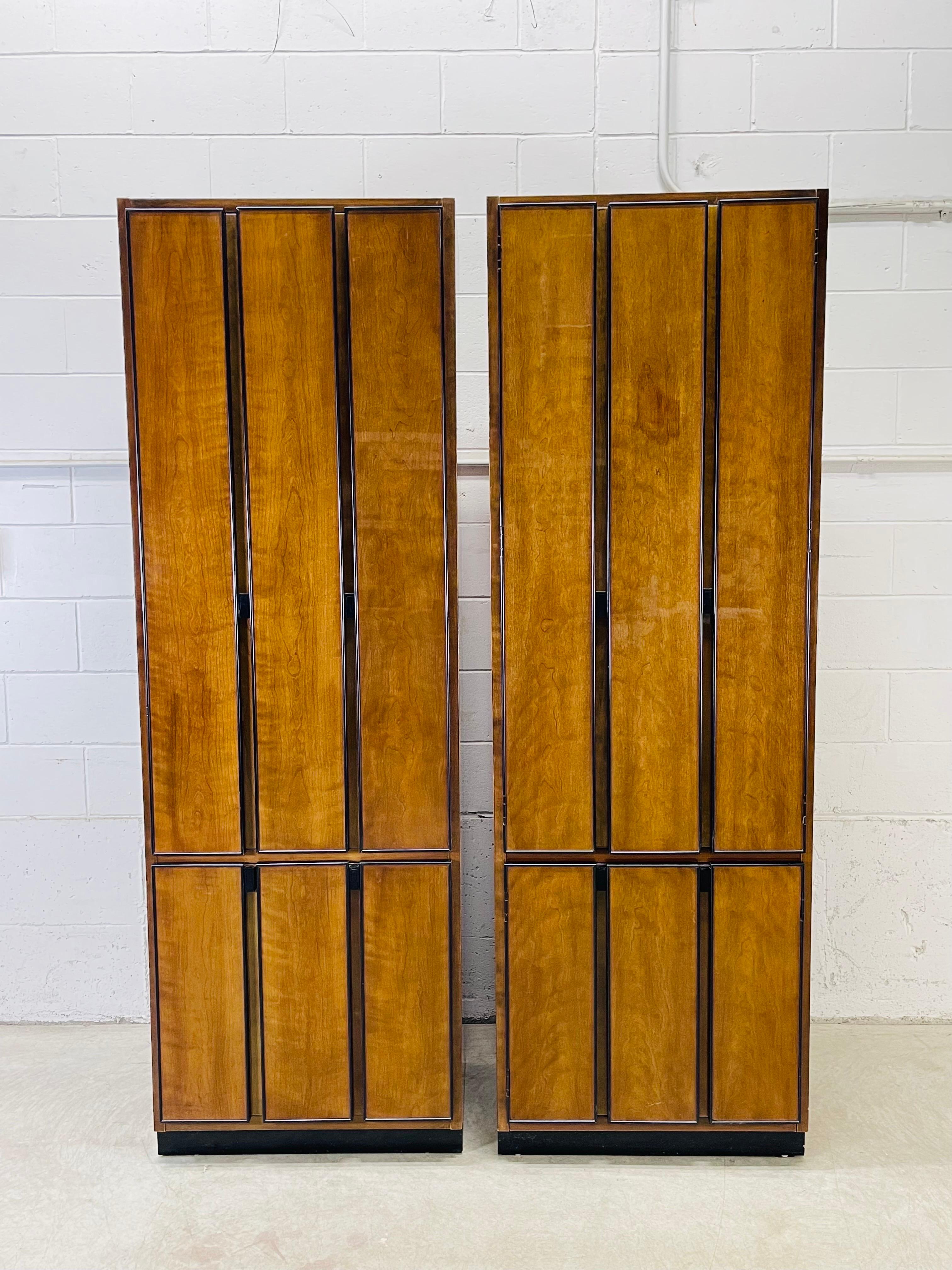 Vintage Henredon Furniture pair of tall mahogany bedroom armoires from the “Circa 1990” collection. Each armoire has three drawers, adjustable shelving and hardware for a hanger rod. You can configure the interior any way you prefer. The armoire is