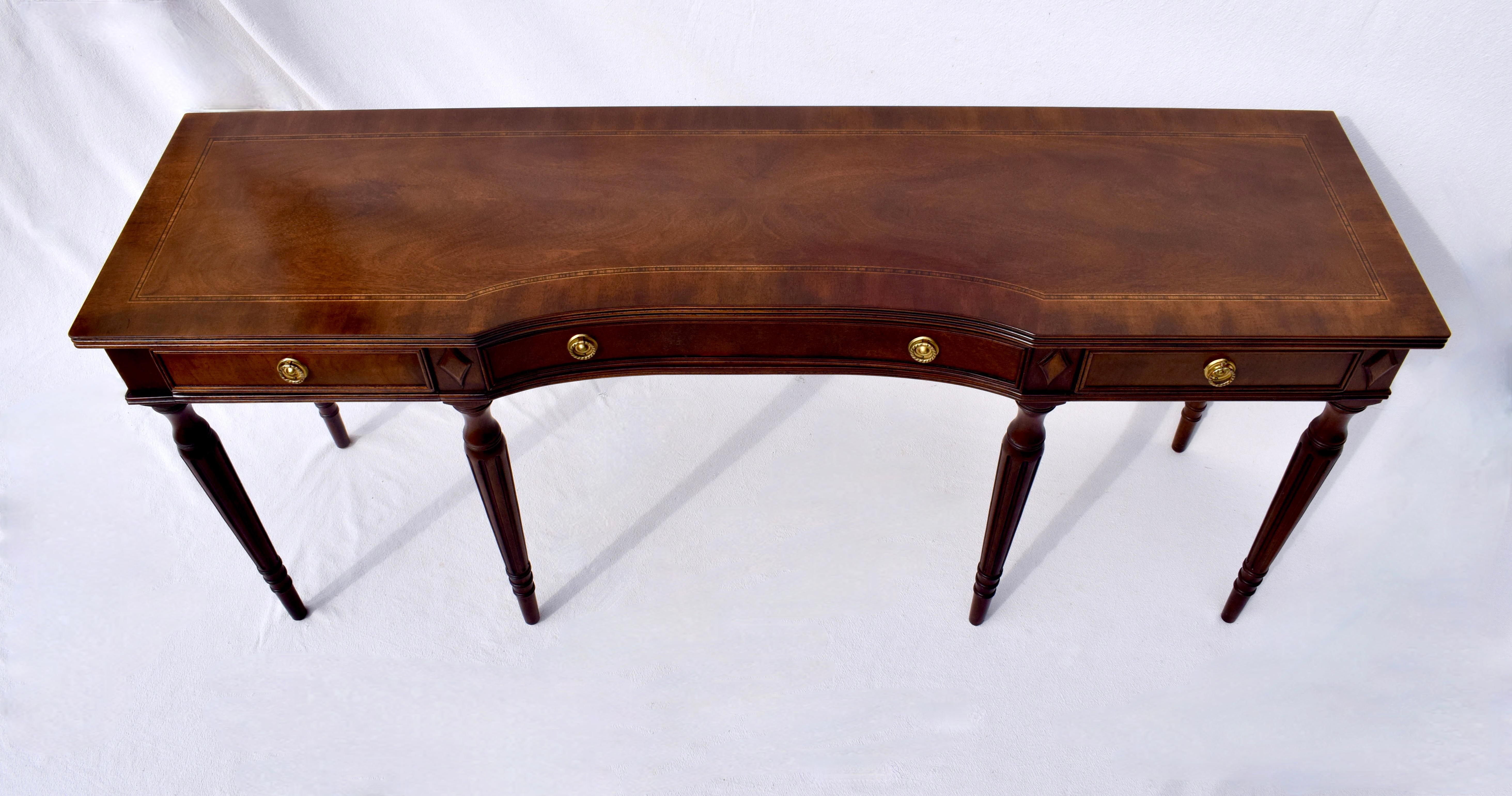Henredon Furniture Traditional Regency style Mahogany three drawer console or sofa table with inlaid trim and banded edge; circa 1980's. Gorgeous wood grains. Measures: 66 wide x 18 deep x 29.25 high.  Excellent condition & ready for use.