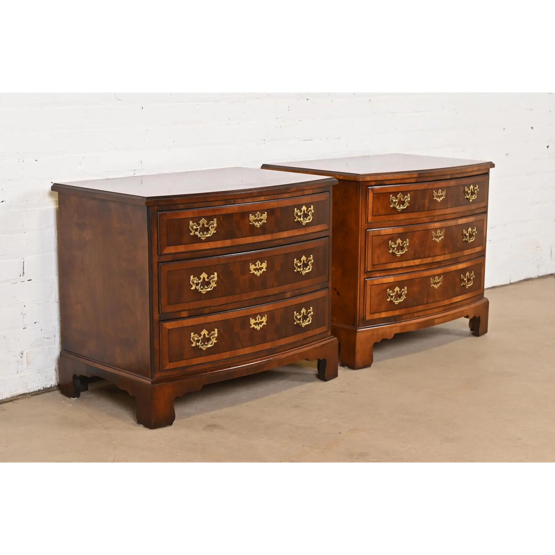 A gorgeous pair of Georgian or Chippendale style three-drawer bow front commodes or nightstands

By Henredon, 