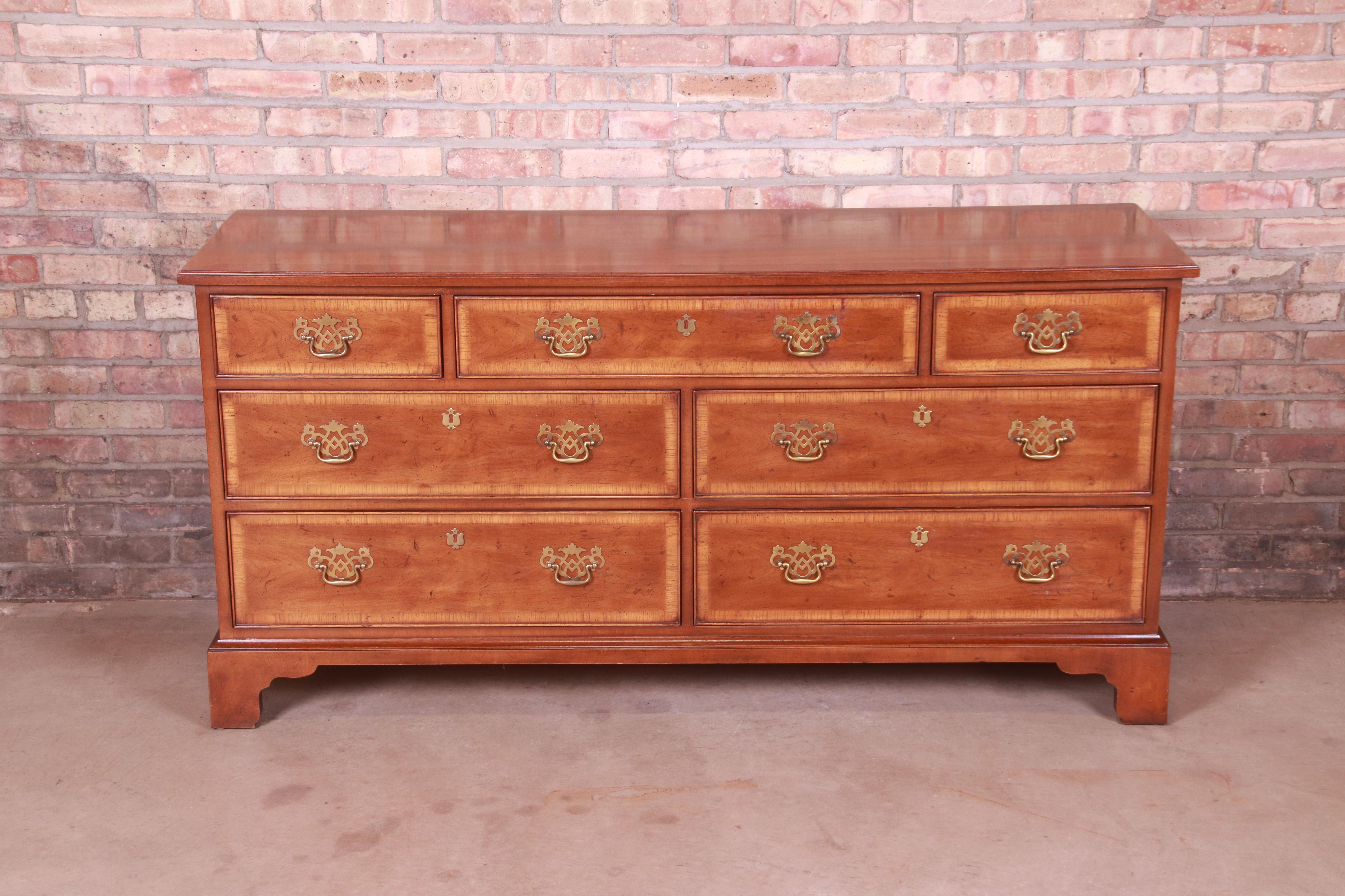 A gorgeous Georgian or Chippendale style seven-drawer dresser or credenza

By Henredon, 