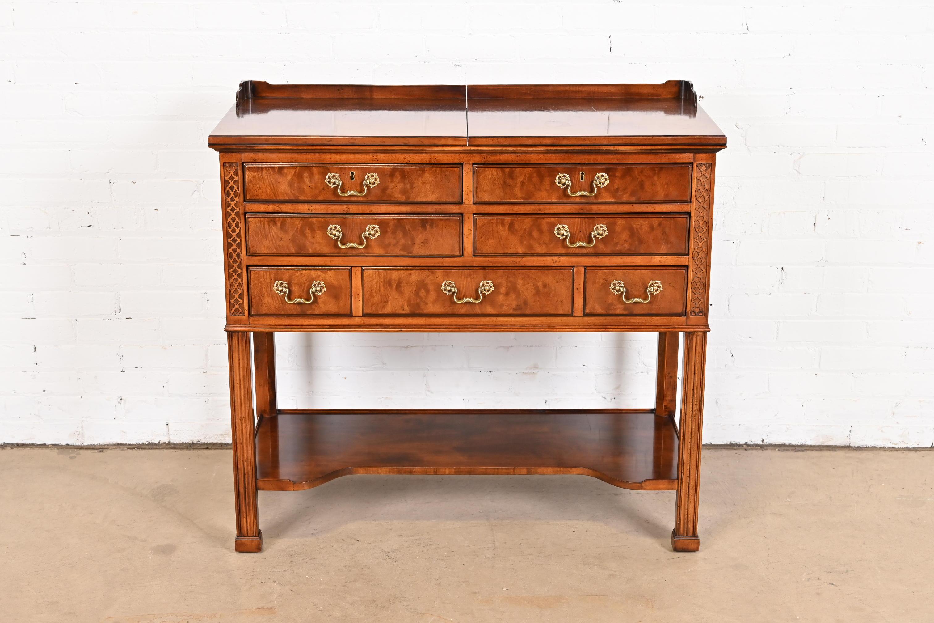 A gorgeous Georgian or Chippendale style flip top dry bar server

By Henredon, 