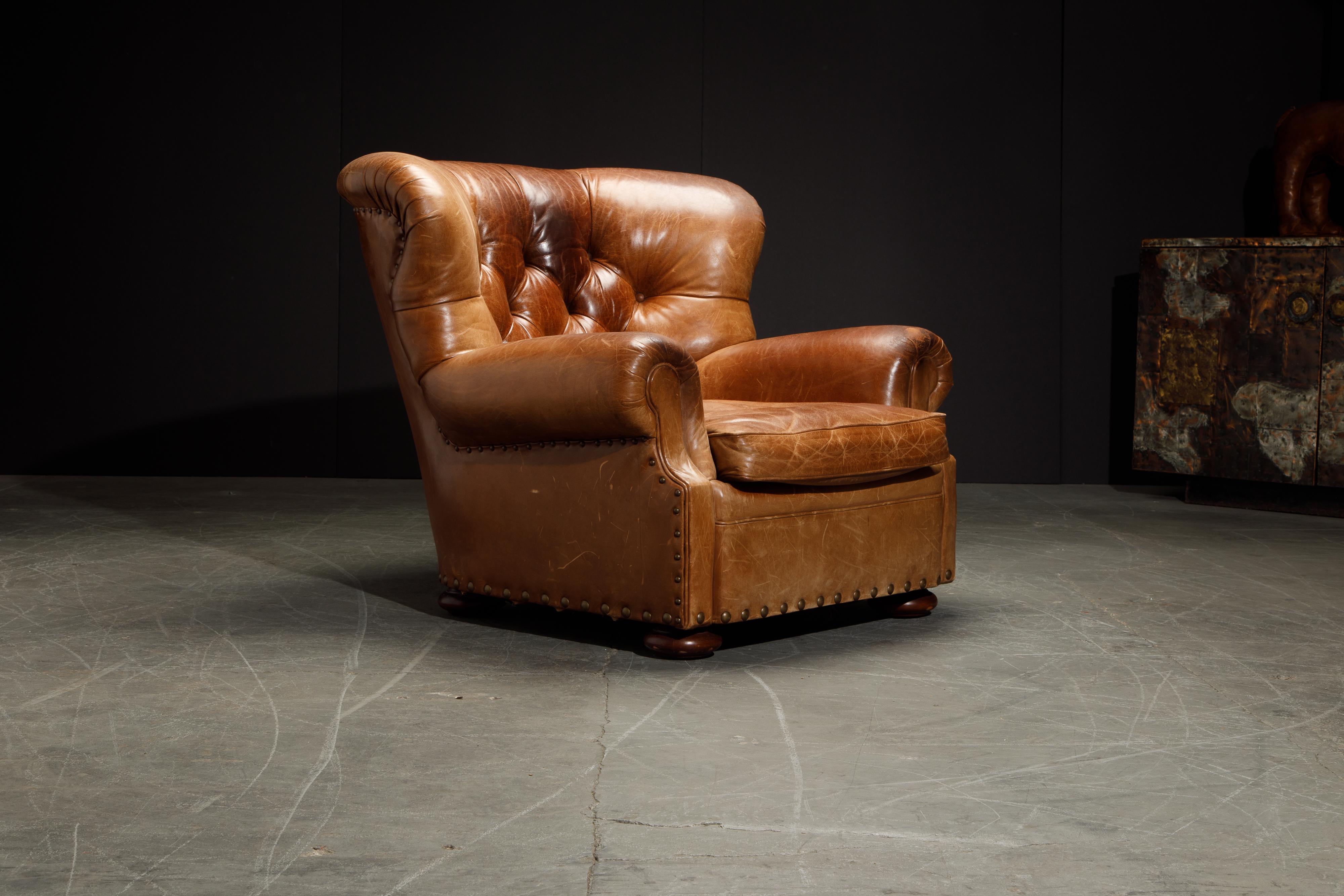 This gorgeous 'Writers' wingback club chair by Henredon for Ralph Lauren has such incredible lightly distressed and moderately patinated leather, very thick and quality natural hides were used in it's making. The original Writer's Chairs retailed by