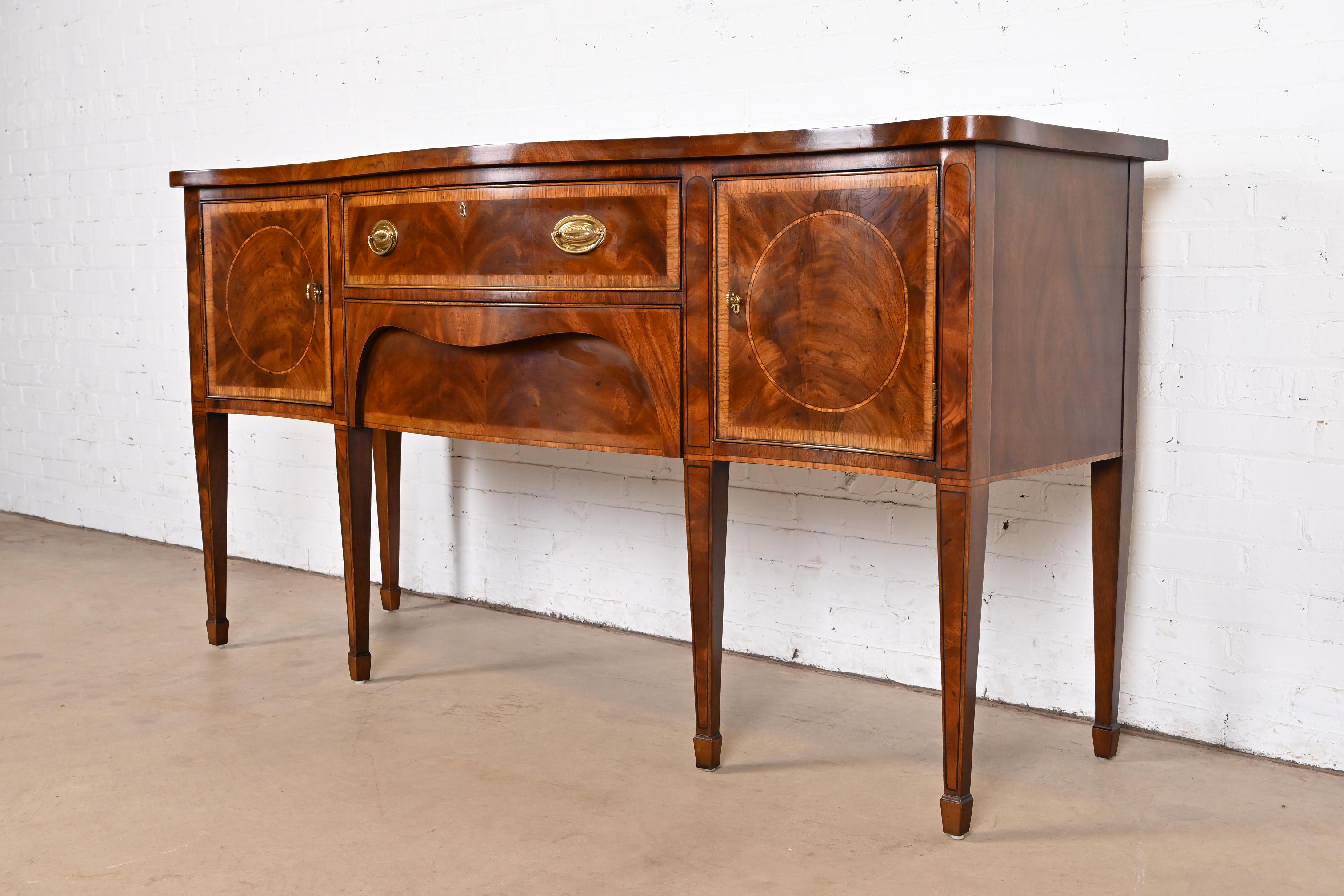 Late 20th Century Henredon Hepplewhite Banded Flame Mahogany Serpentine Front Sideboard Credenza