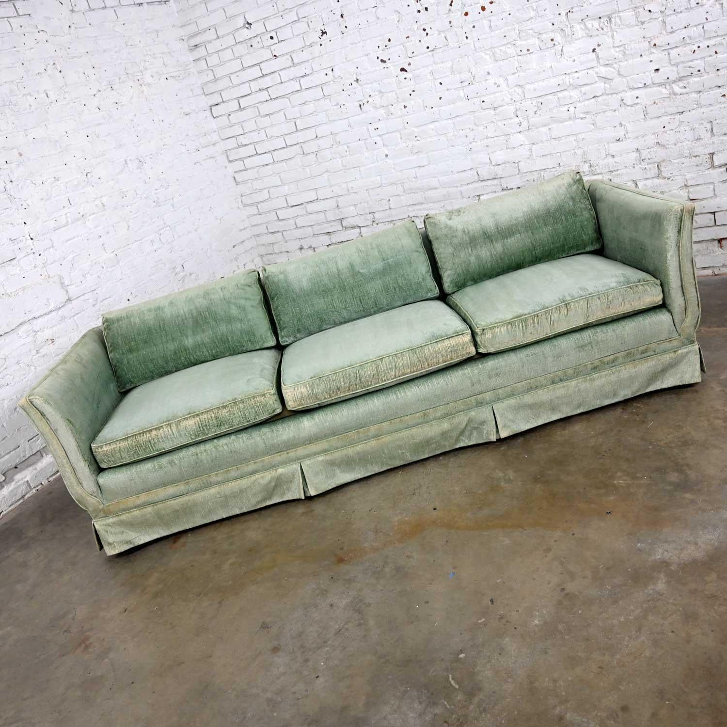 Fabulous vintage modern and Hollywood Regency and a bit Art Deco mint green velvet modified tuxedo style sofa by Henredon. Beautiful condition, keeping in mind that this is vintage and not new so will have signs of use and wear. The original velvet