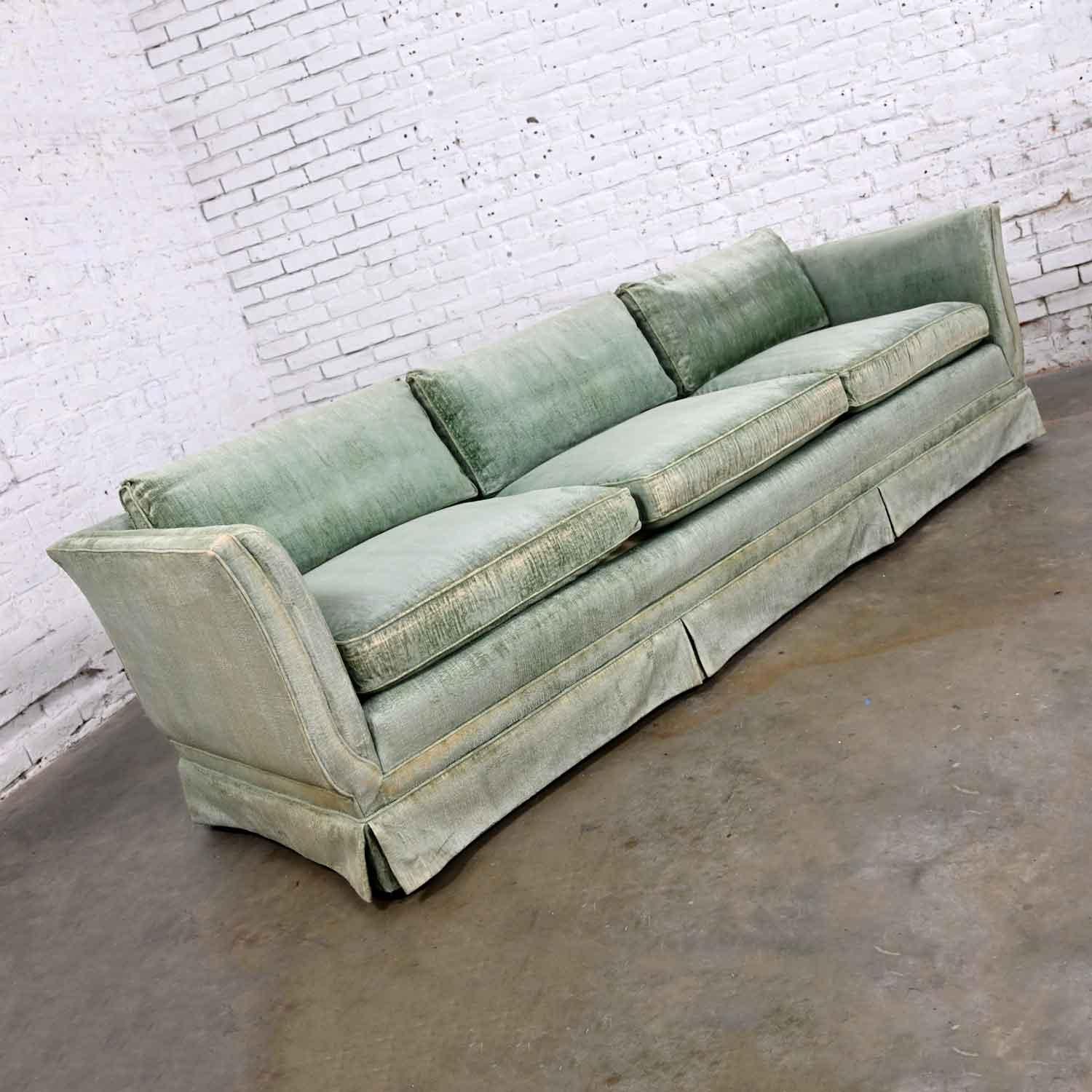 sage green velvet sofa