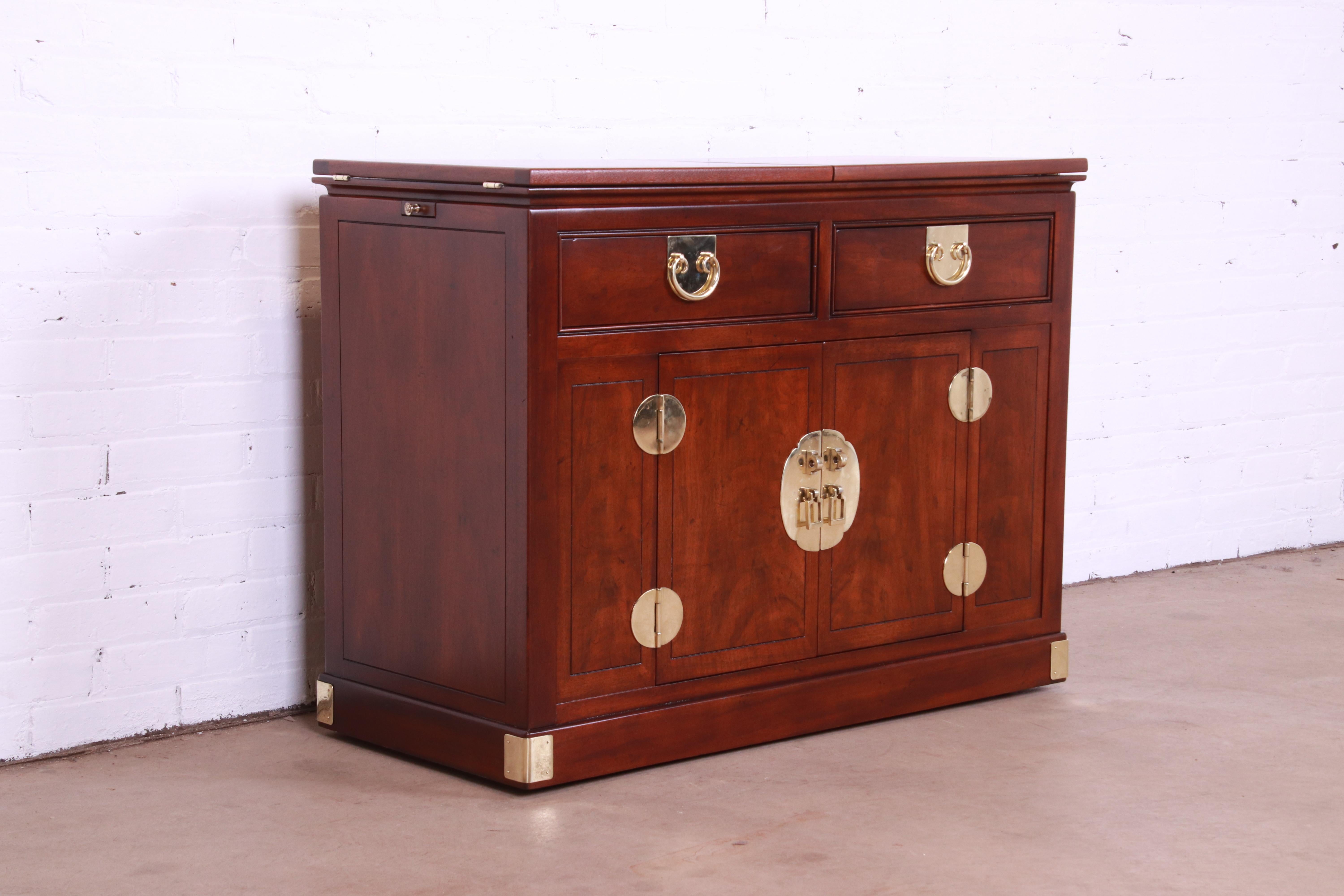 Late 20th Century Henredon Hollywood Regency Chinoiserie Walnut and Brass Rolling Bar Cabinet