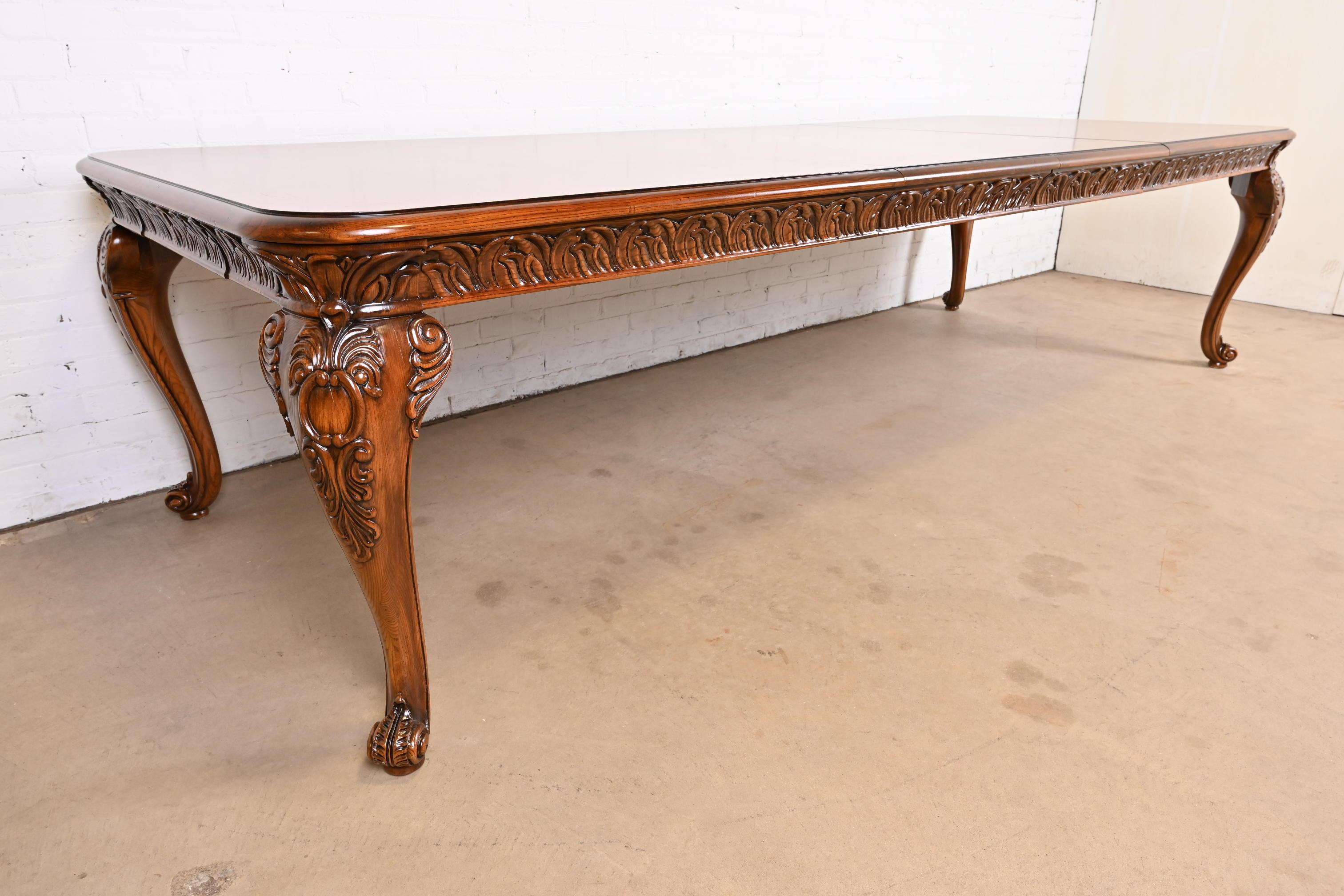 Henredon Italian Baroque Carved Oak and Burl Wood Dining Table, Newly Refinished In Good Condition For Sale In South Bend, IN