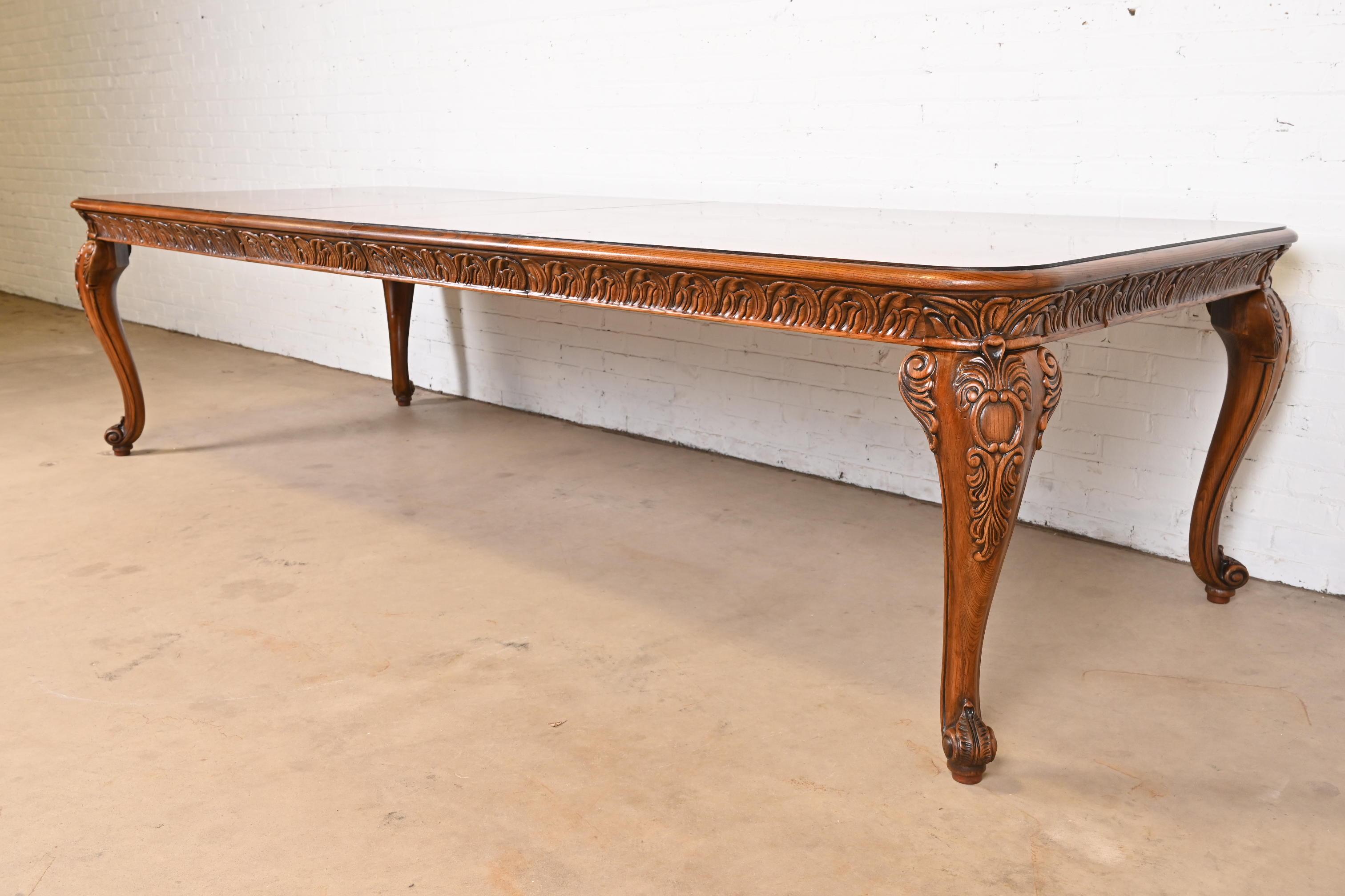 Henredon Italian Baroque Carved Oak and Burl Wood Extension Dining Table In Good Condition For Sale In South Bend, IN