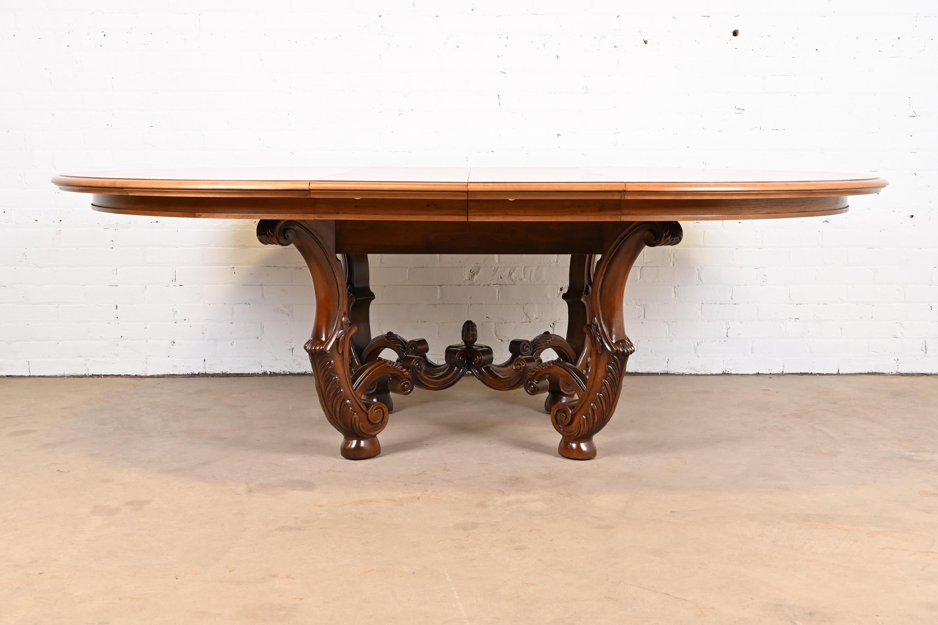 An exceptional Italian Provincial or Mediterranean style extension pedestal dining table

By Henredon, 