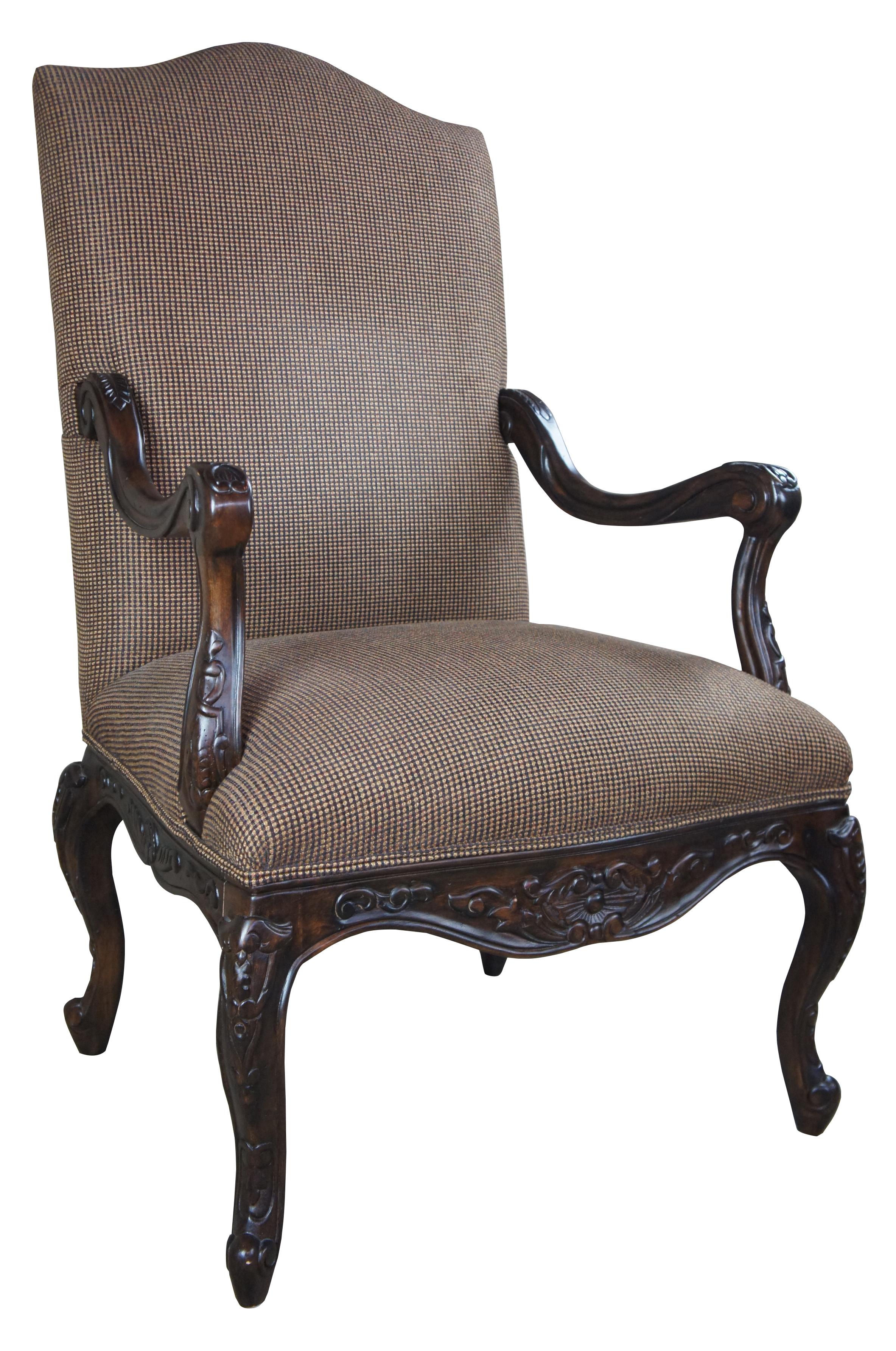 Cynthia armchair by Henredon for Heritage Home Group. Part of the upholstery collection with a tweet fabric and a hardwood carved frame in Java finish. H0091.