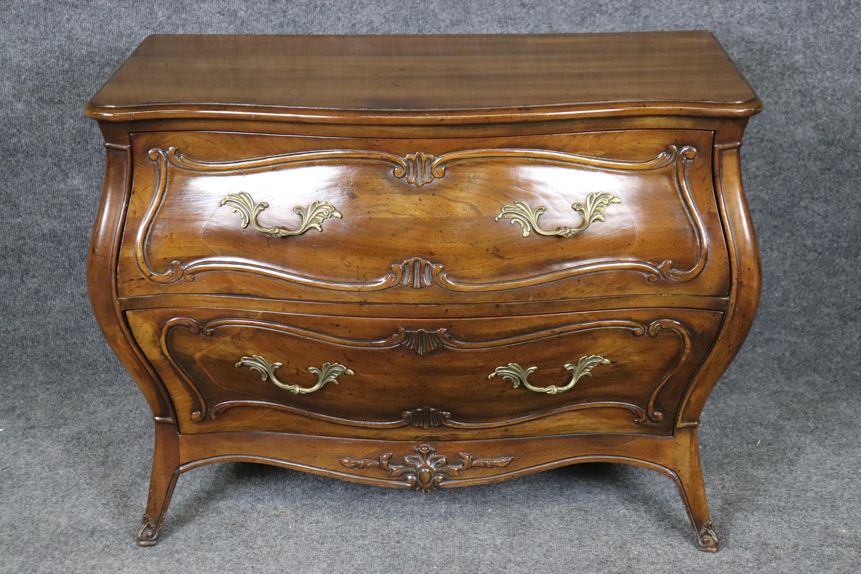 Dimensions - H: 27 in W: 36 1/2 in D: 18 1/4 in 

Elevate your space with this exquisite Henredon Louis XV style commode, a timeless piece crafted to evoke the elegance and sophistication of 18th-century French design. This stunning chest of drawers
