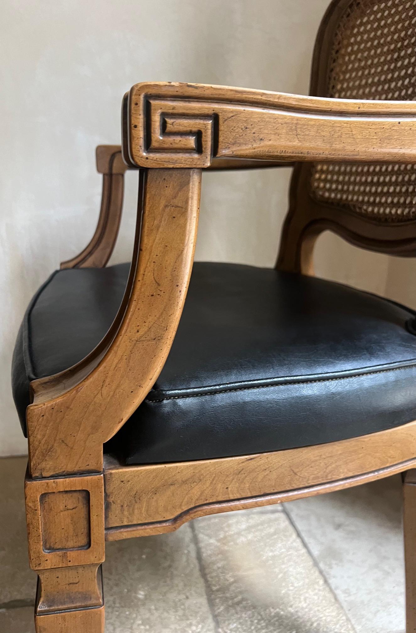 Vintage French Country cane back armchair  chair with faux leather seat made by Henredon, made in the 1960's.

All my furniture can be picked up in the San Francisco Bay area for free.