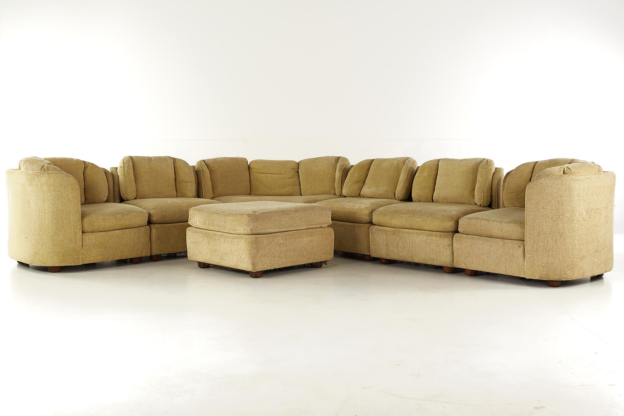 Henredon Mid Century Folio 500 7 Piece Modular Scallop Back Sectional Sofa

This sectional sofa measures: 142 wide x 110 deep x 29.5 inches high, with a seat height of 16 and arm height of 28 inches

All pieces of furniture can be had in what we
