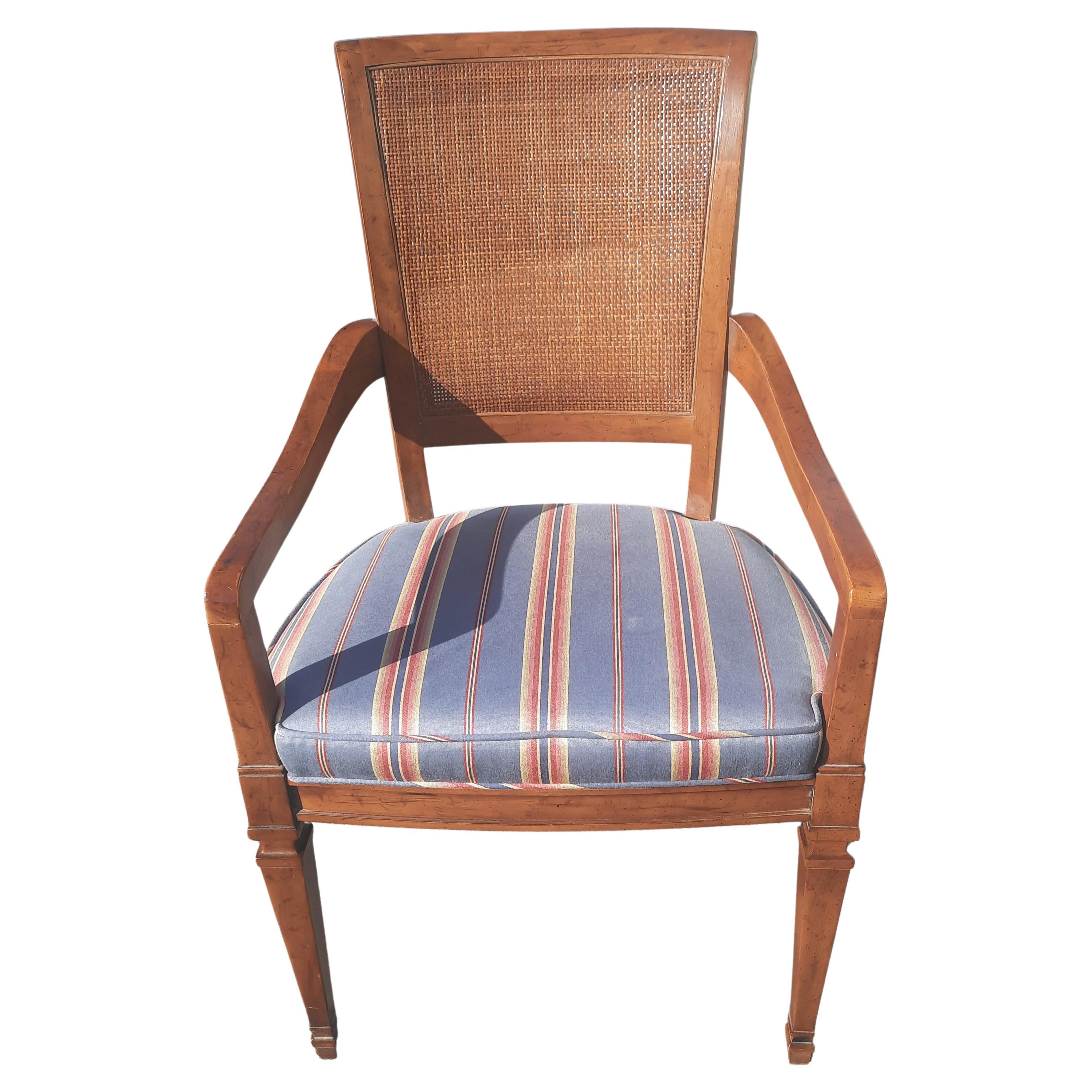 A pair of armchairs in the French Country style by Henredon. Walnut with cane backs, fabric seats. Made in the Morganton, NC, USA in the mid-20th century. Measures: Overall: 21.25