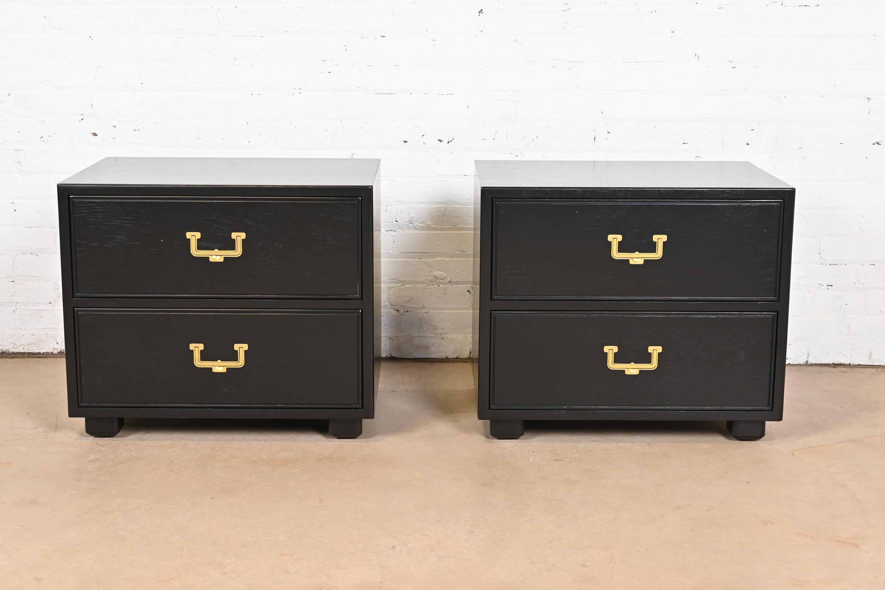 A gorgeous pair of mid-century modern Hollywood Regency Campaign style commodes or nightstands

By Henredon, 