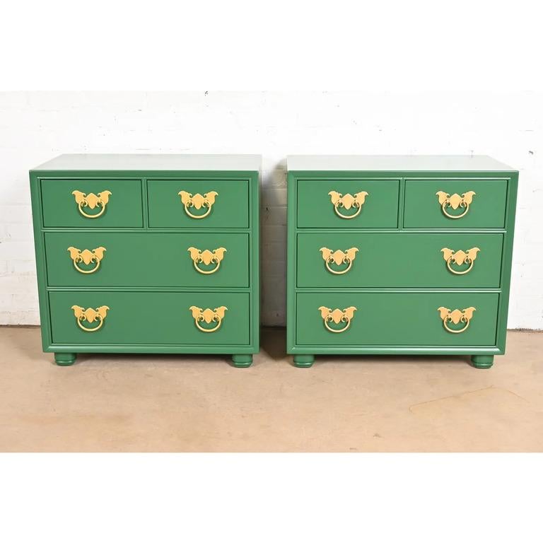 An exceptional pair of Mid-Century Modern Hollywood Regency Chinoiserie four-drawer nightstands or chests of drawers

By Henredon

USA, Circa 1970s

Green lacquered walnut, with original Asian-inspired brass hardware.

Measures: 28.13