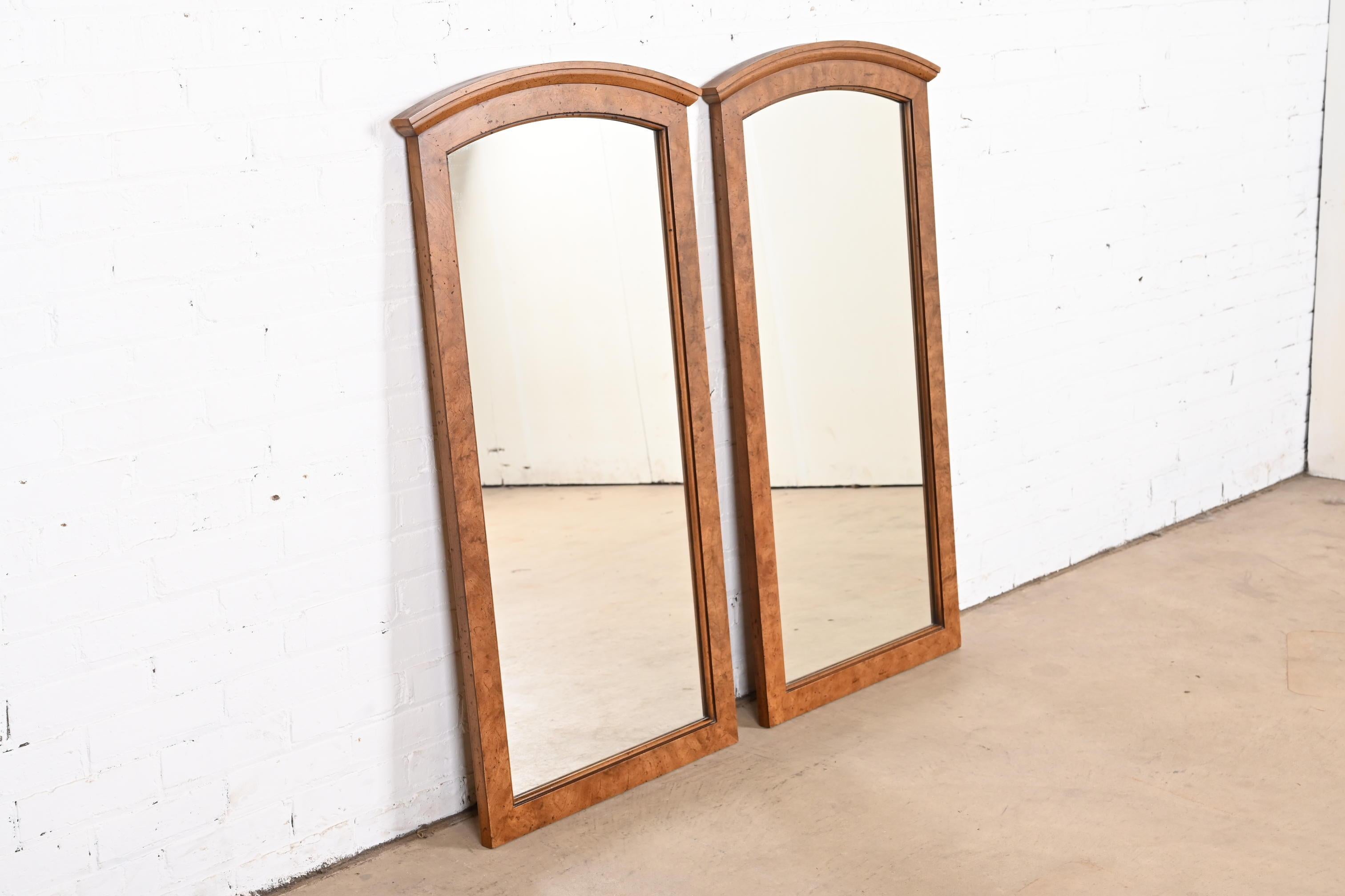 A beautiful pair of Mid-Century Modern burl wood framed tall arched wall mirrors

By Henredon

USA, 1960s

Measures: 24