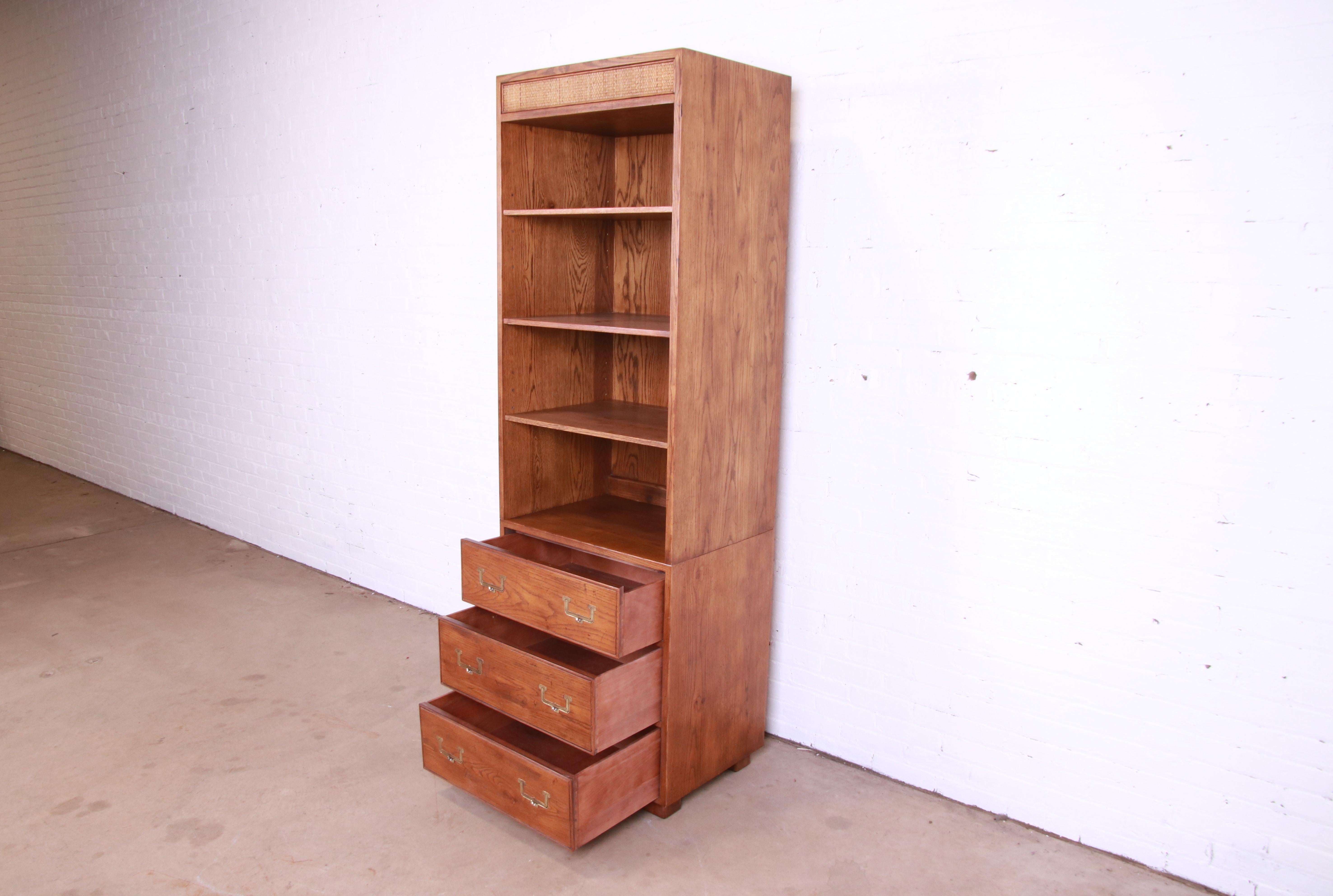Late 20th Century Henredon Mid-Century Modern Campaign Oak and Cane Bookcases on Chests, Set of 3