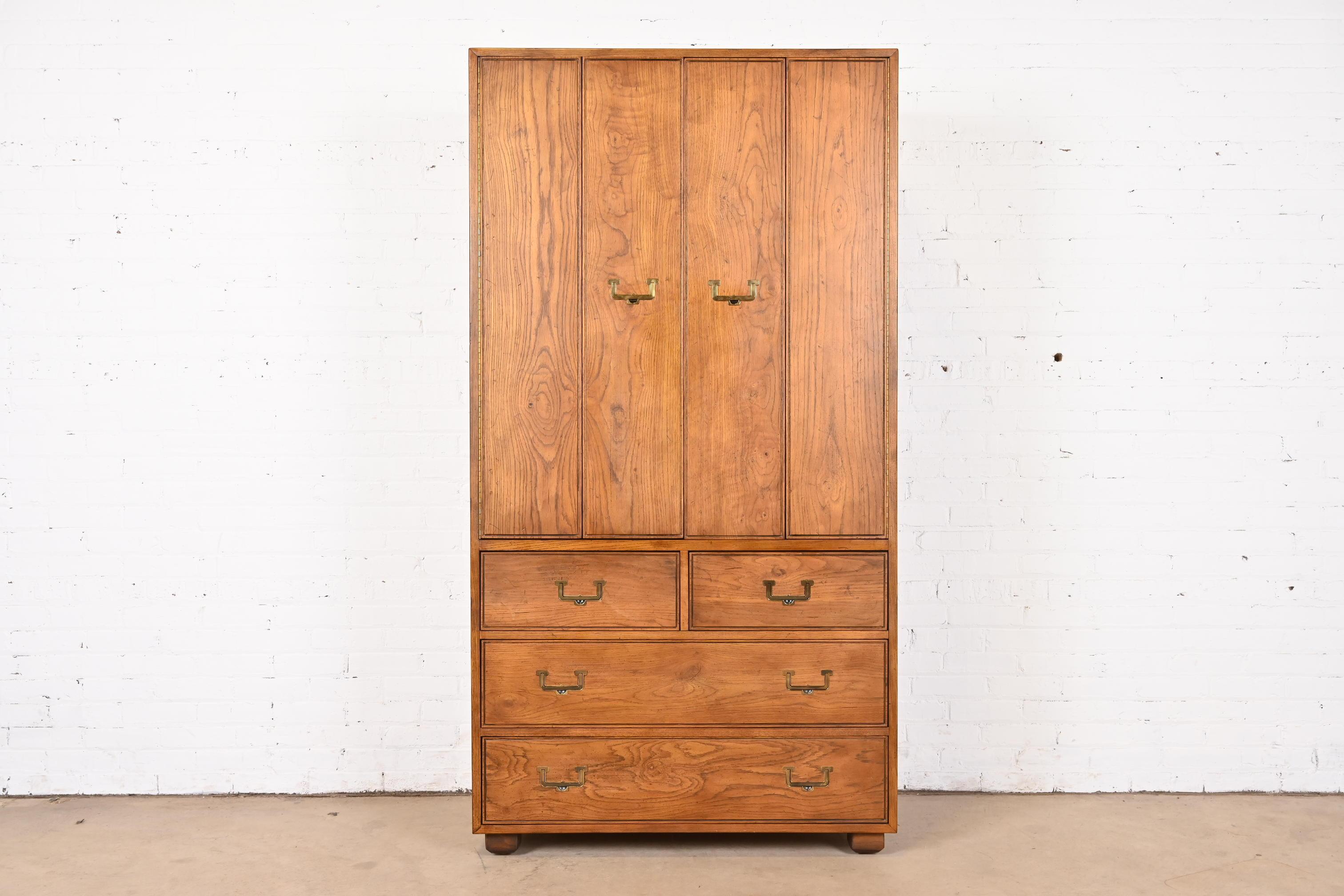 A gorgeous Mid-Century Modern Campaign style armoire dresser or gentleman's chest

By Henredon, 