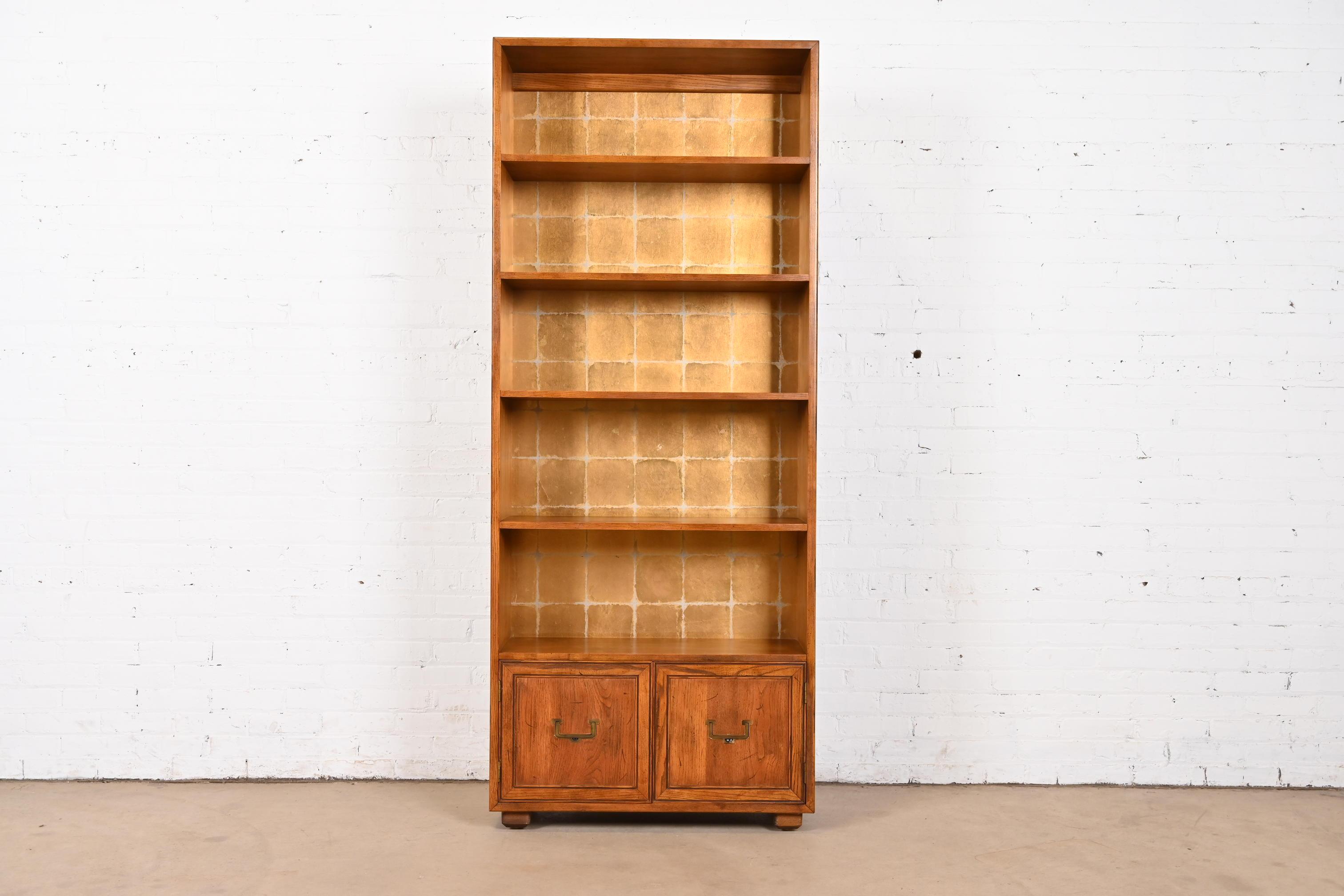 A gorgeous Mid-Century Modern Campaign bookcase cabinet

By Henredon, 