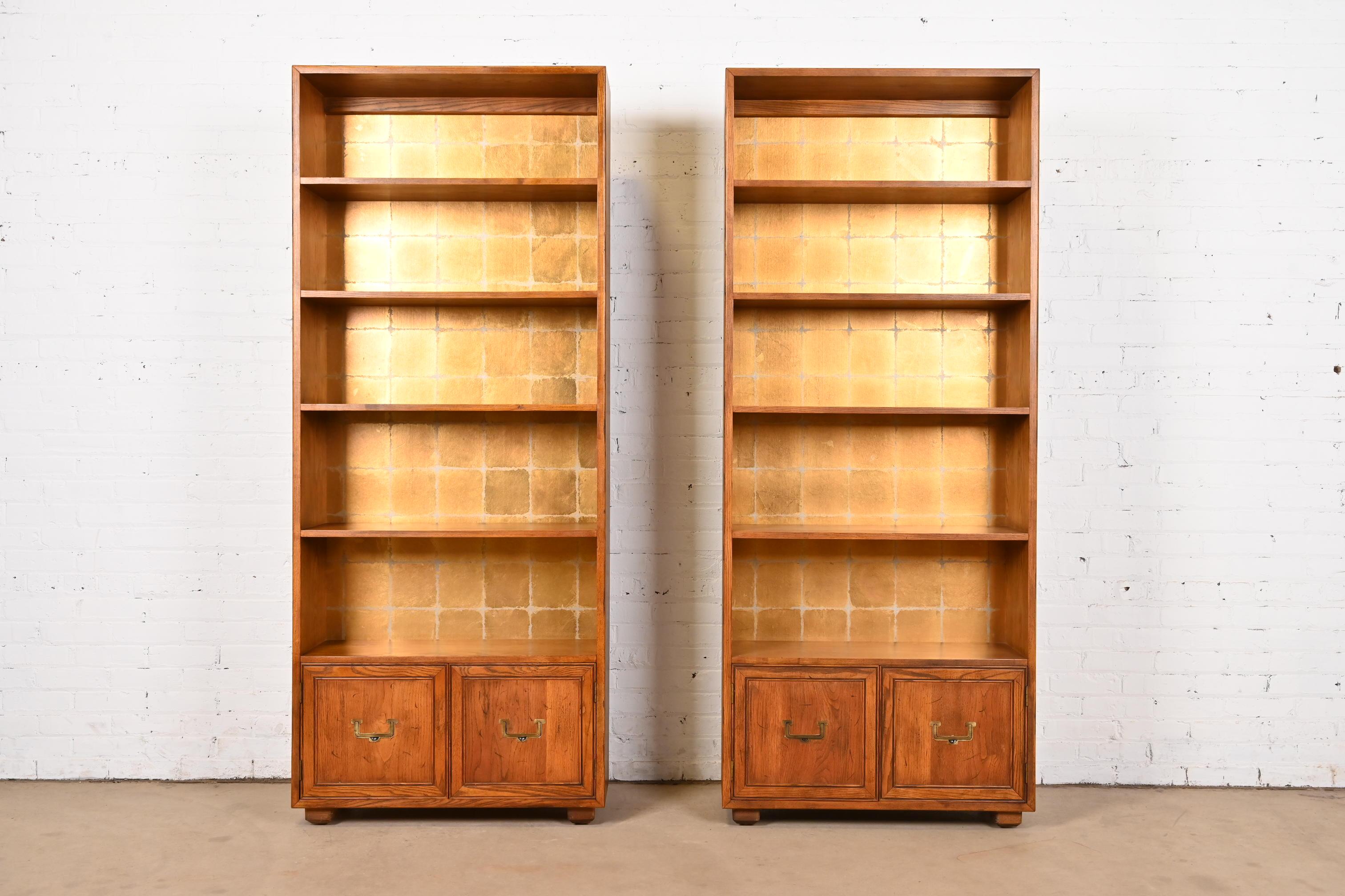 A gorgeous pair of Mid-Century Modern Campaign bookcase cabinets

By Henredon, 